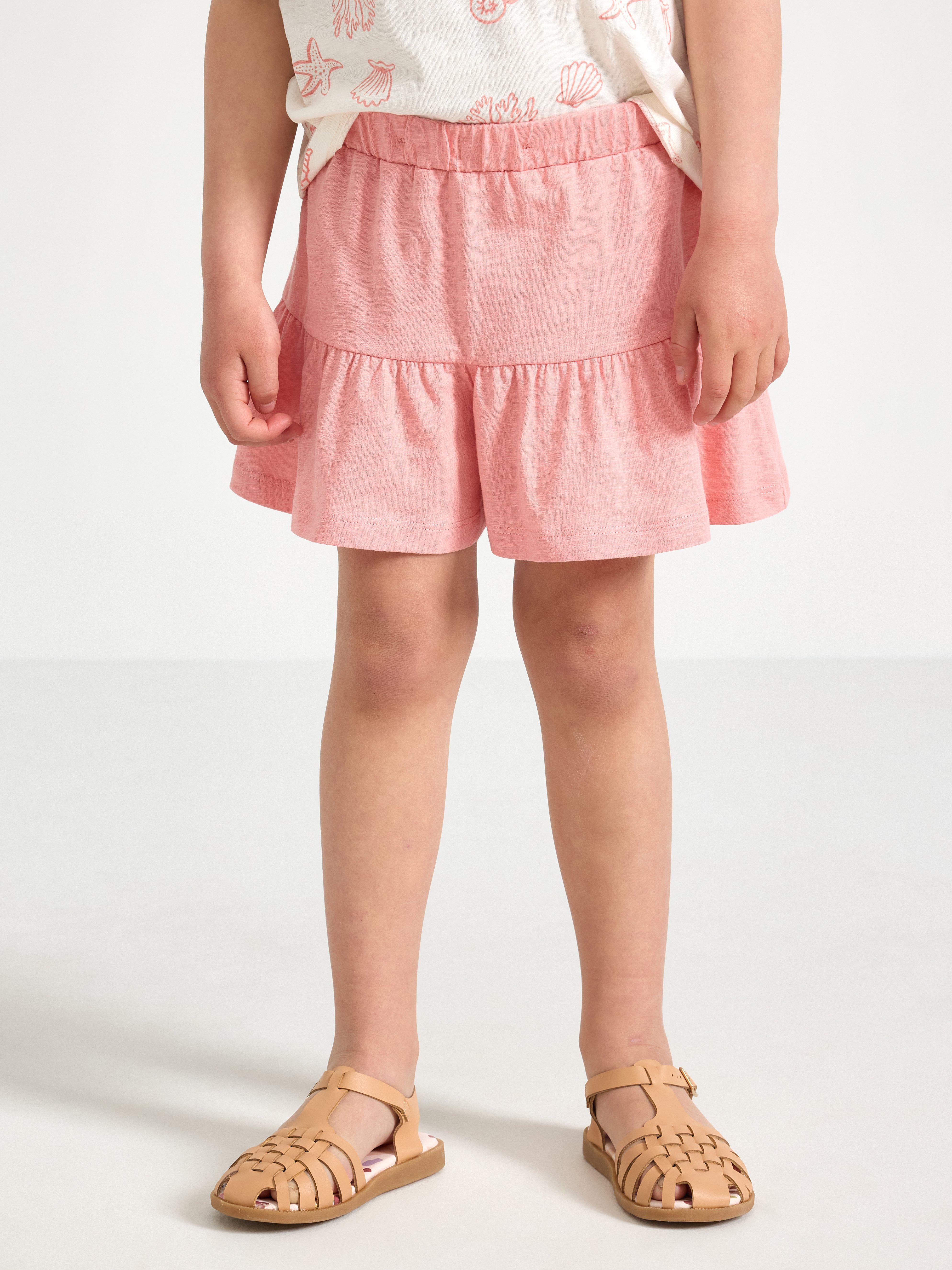 Falda culotte con volantes rosa