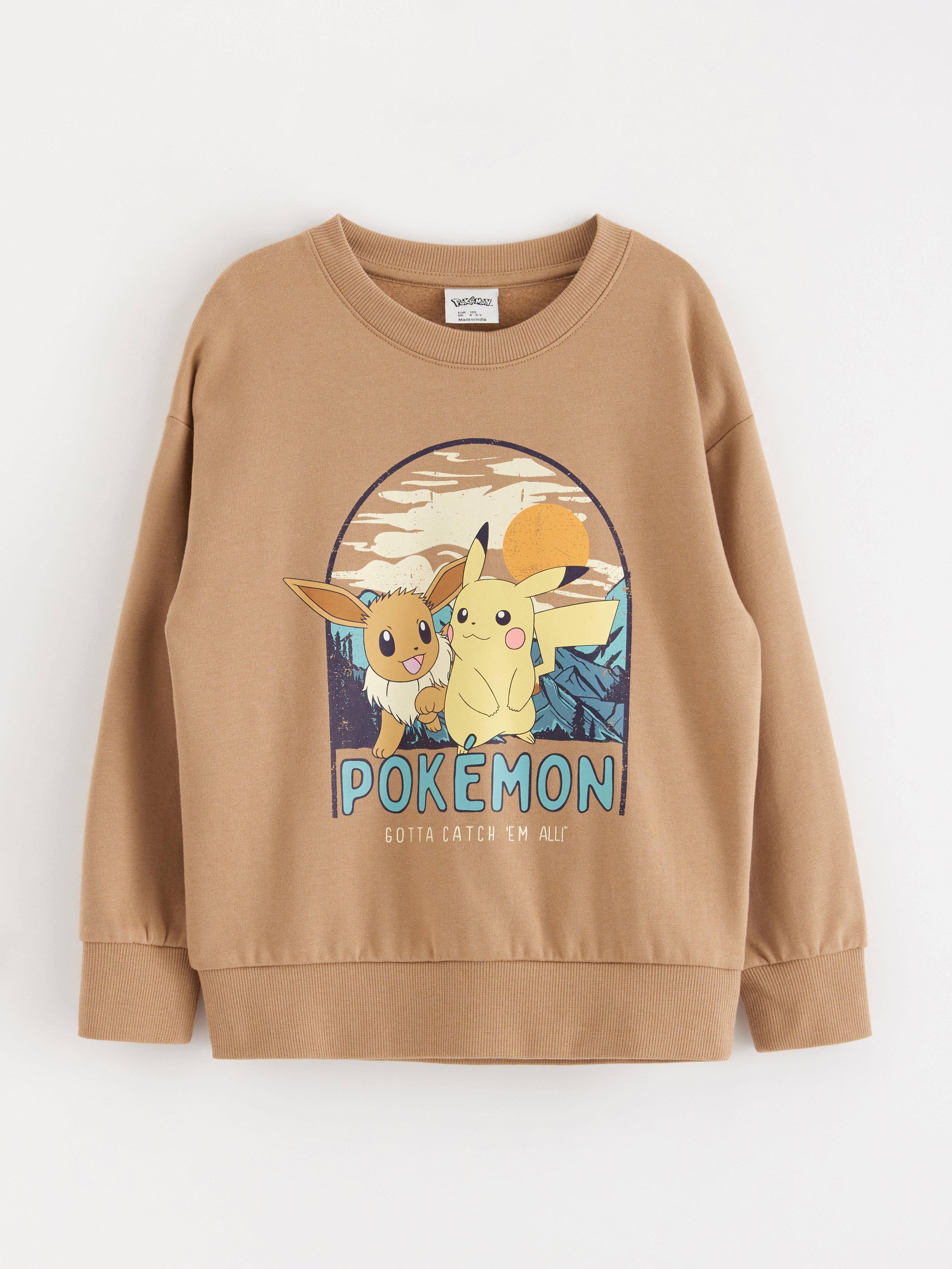 Pokémon dukserica svijetlo bež boje