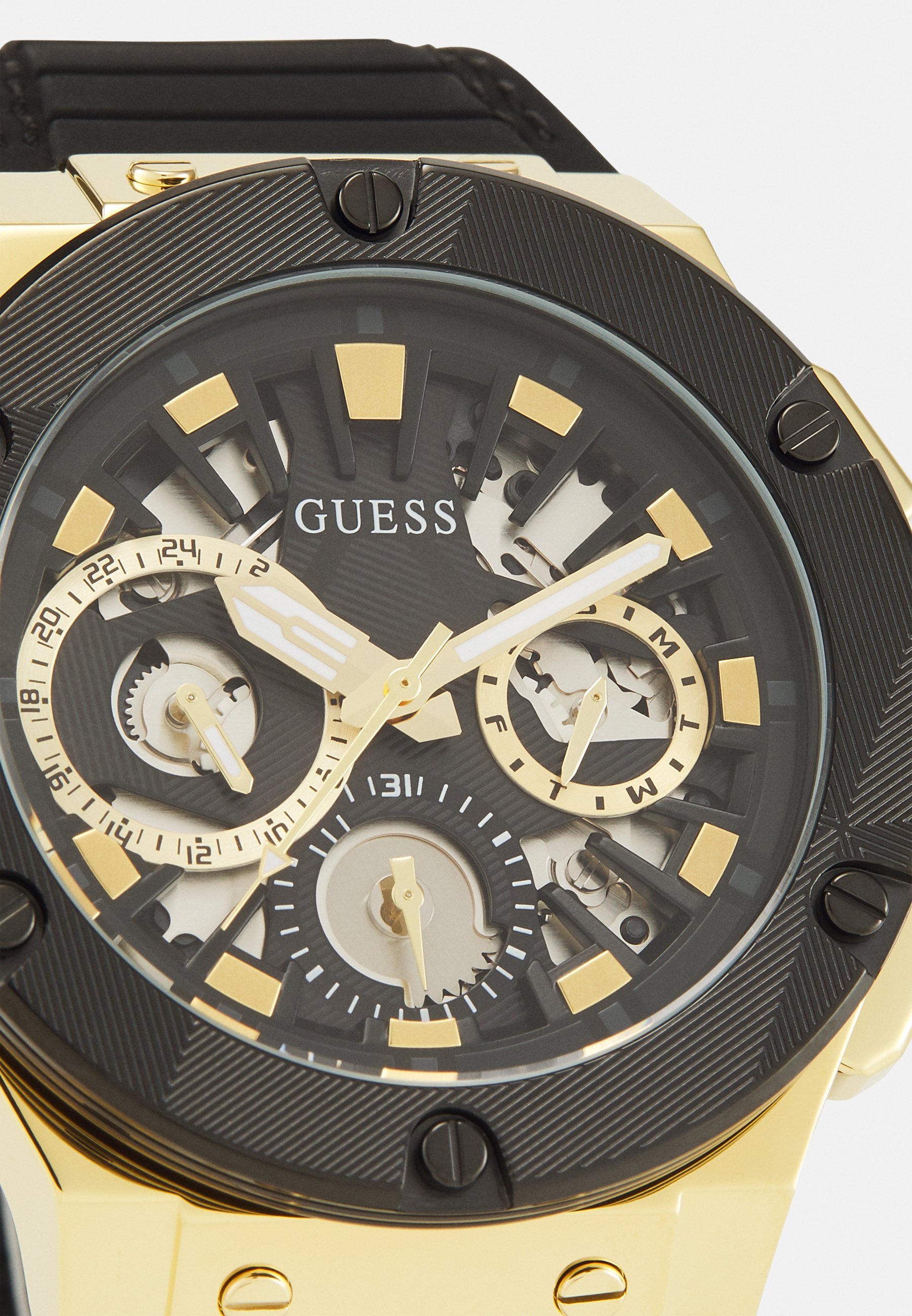 Guess CIRCUIT - Horloge - zwart met zonnestralen/goudkleurig