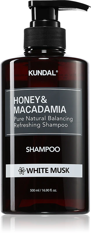 Shampoo natural KUNDAL com mel e almíscar branco de macadâmia para cabelos secos e danificados.