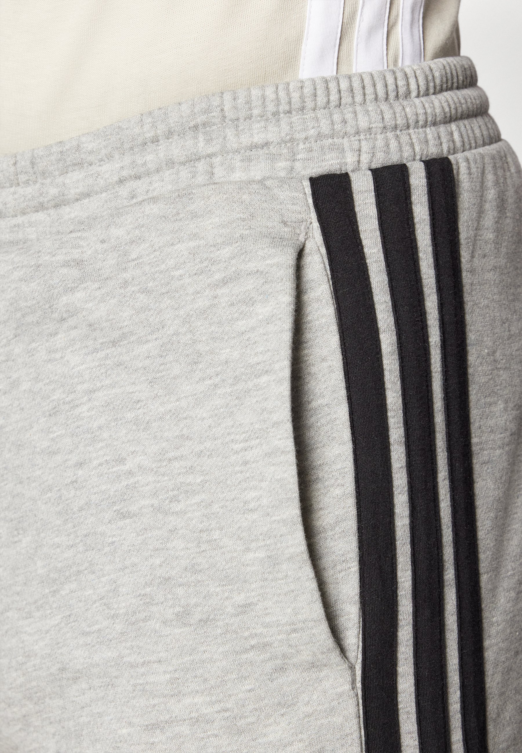 Teplákové kalhoty adidas Sportswear - středně šedá vřesová/černá