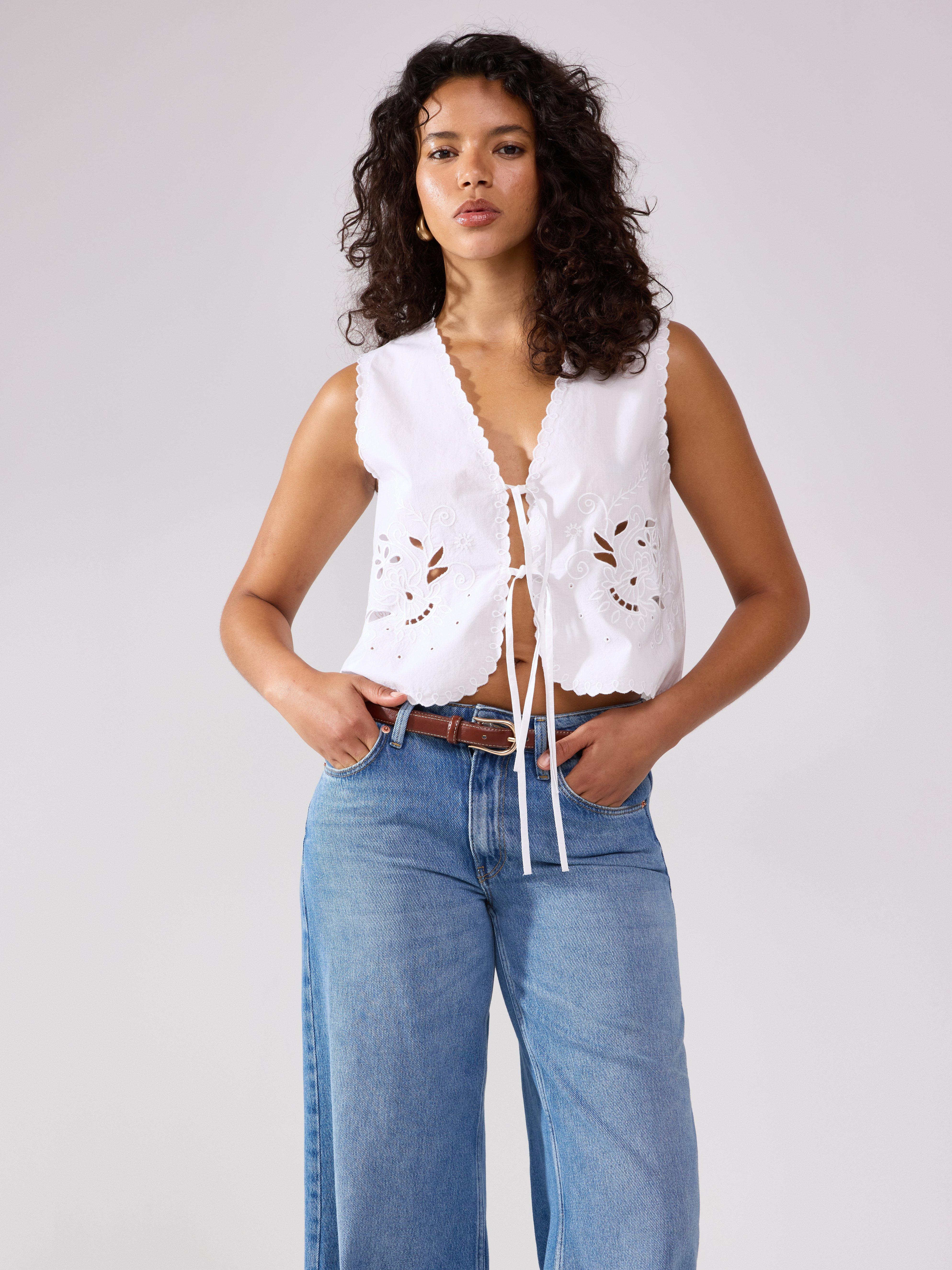Väst med broderi White