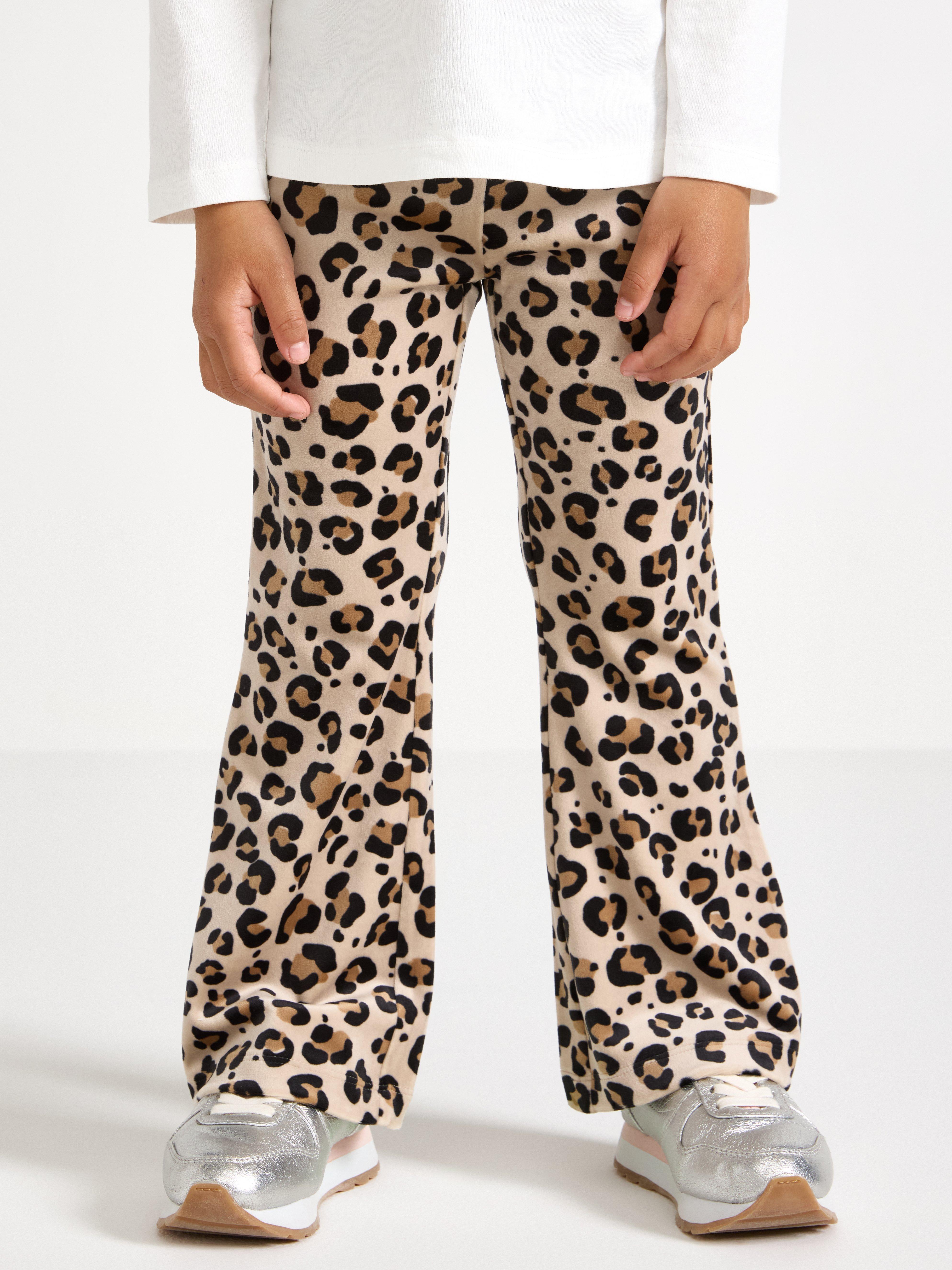 Calças legging flare em veludo bege