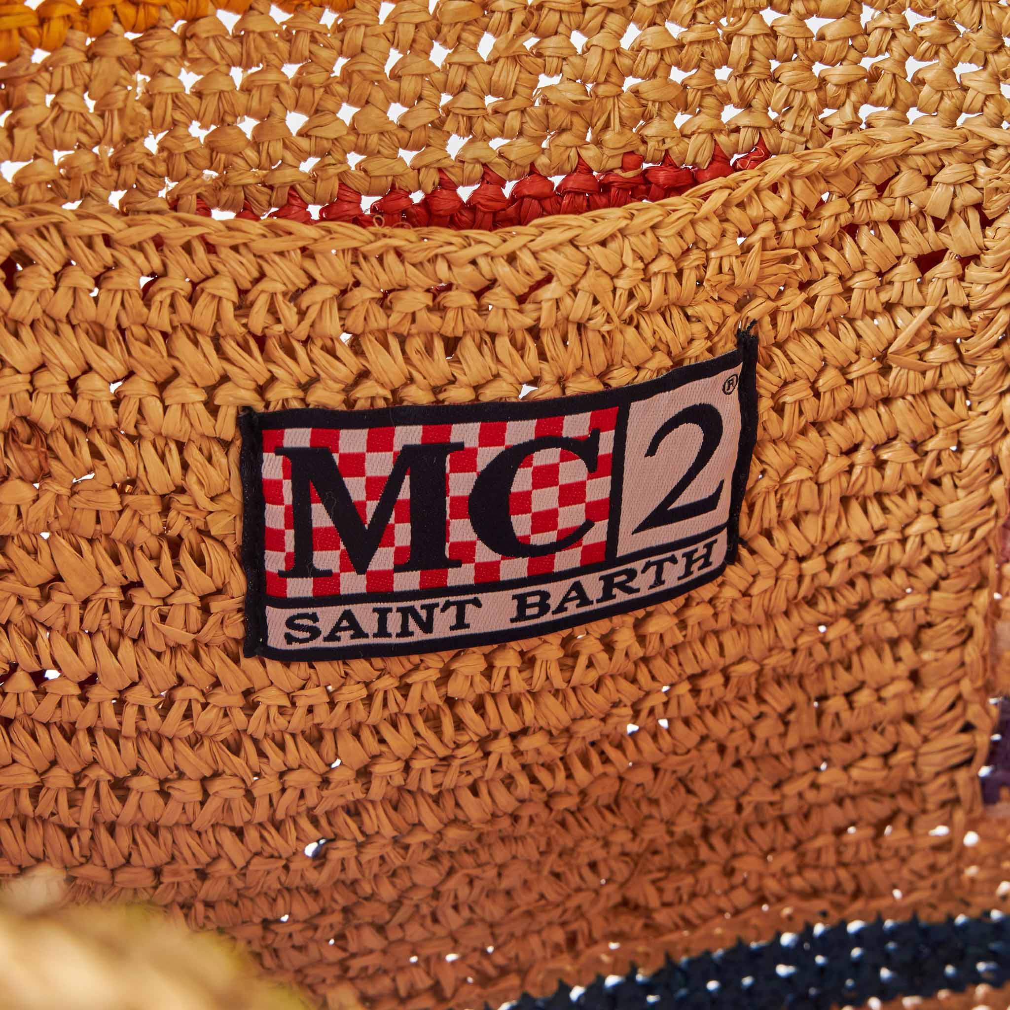 Raffia bucket bag met veelkleurige strepen en borduurwerk