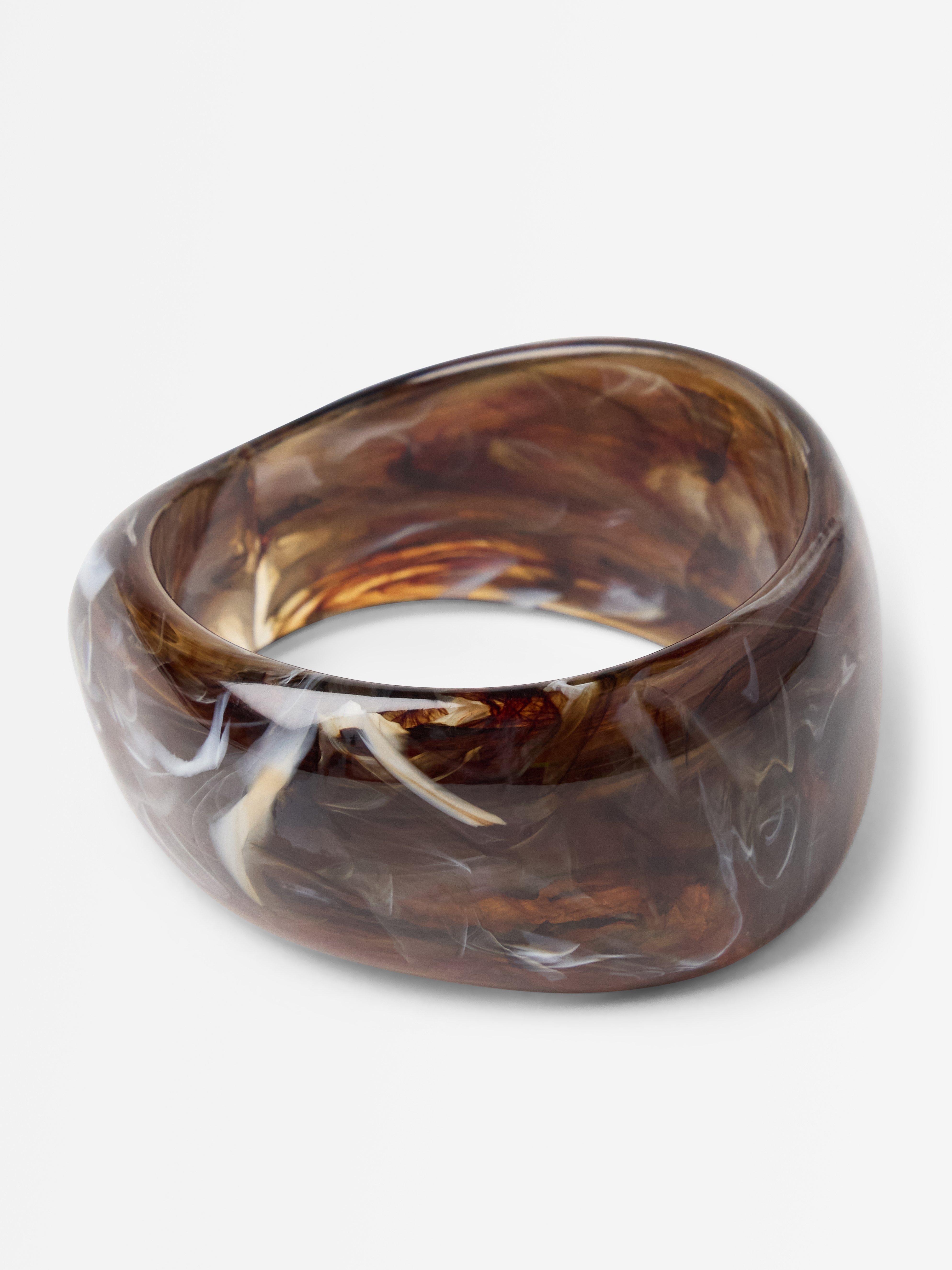 Pulsera marrón empolvado