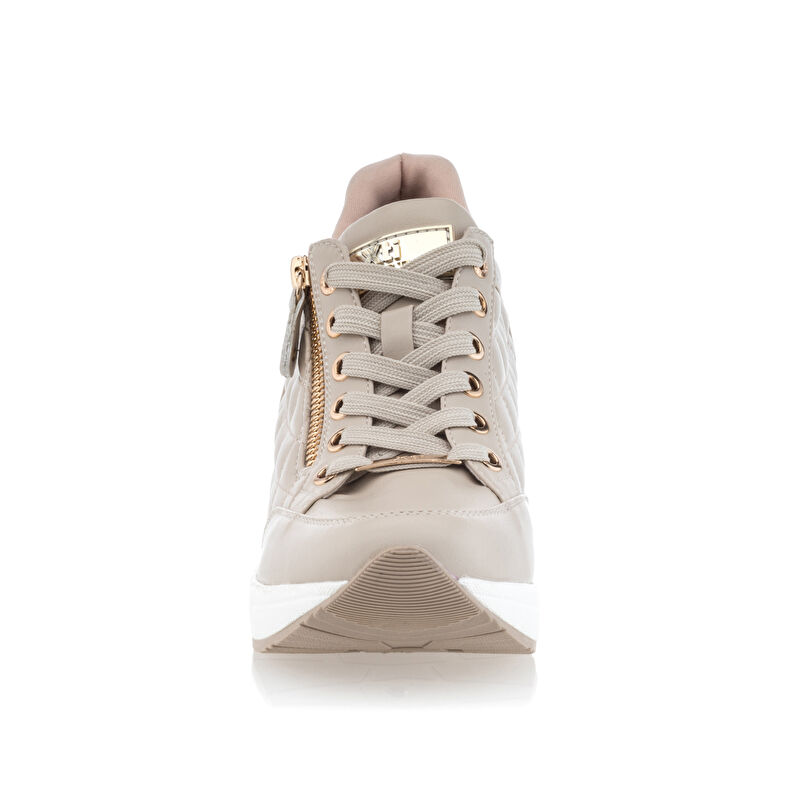 Zapatillas deportivas para mujer color beige.