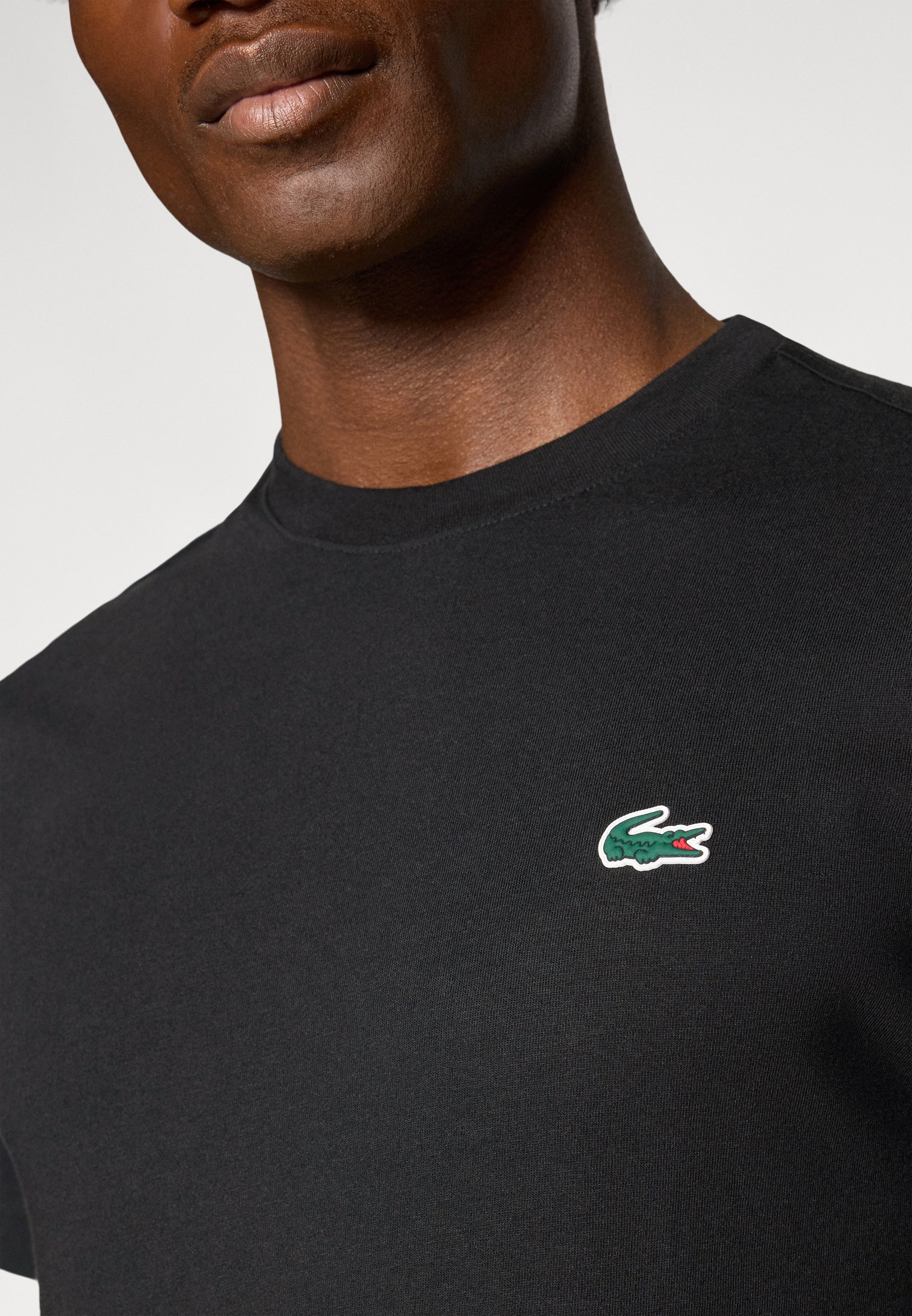 Lacoste Sport FADING - Sport-T-Shirt - schwarz