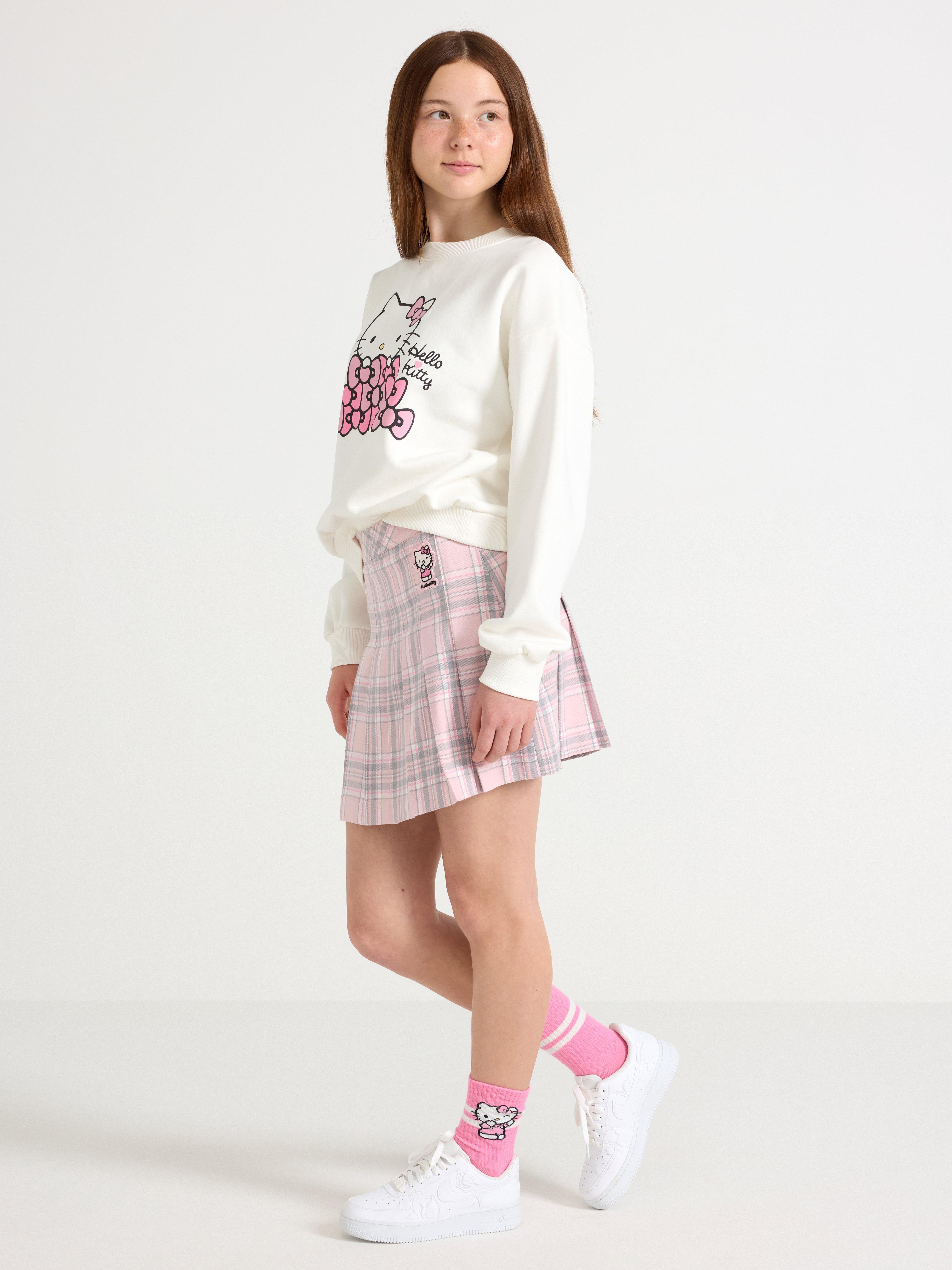 Saia plissada Hello Kitty rosa claro