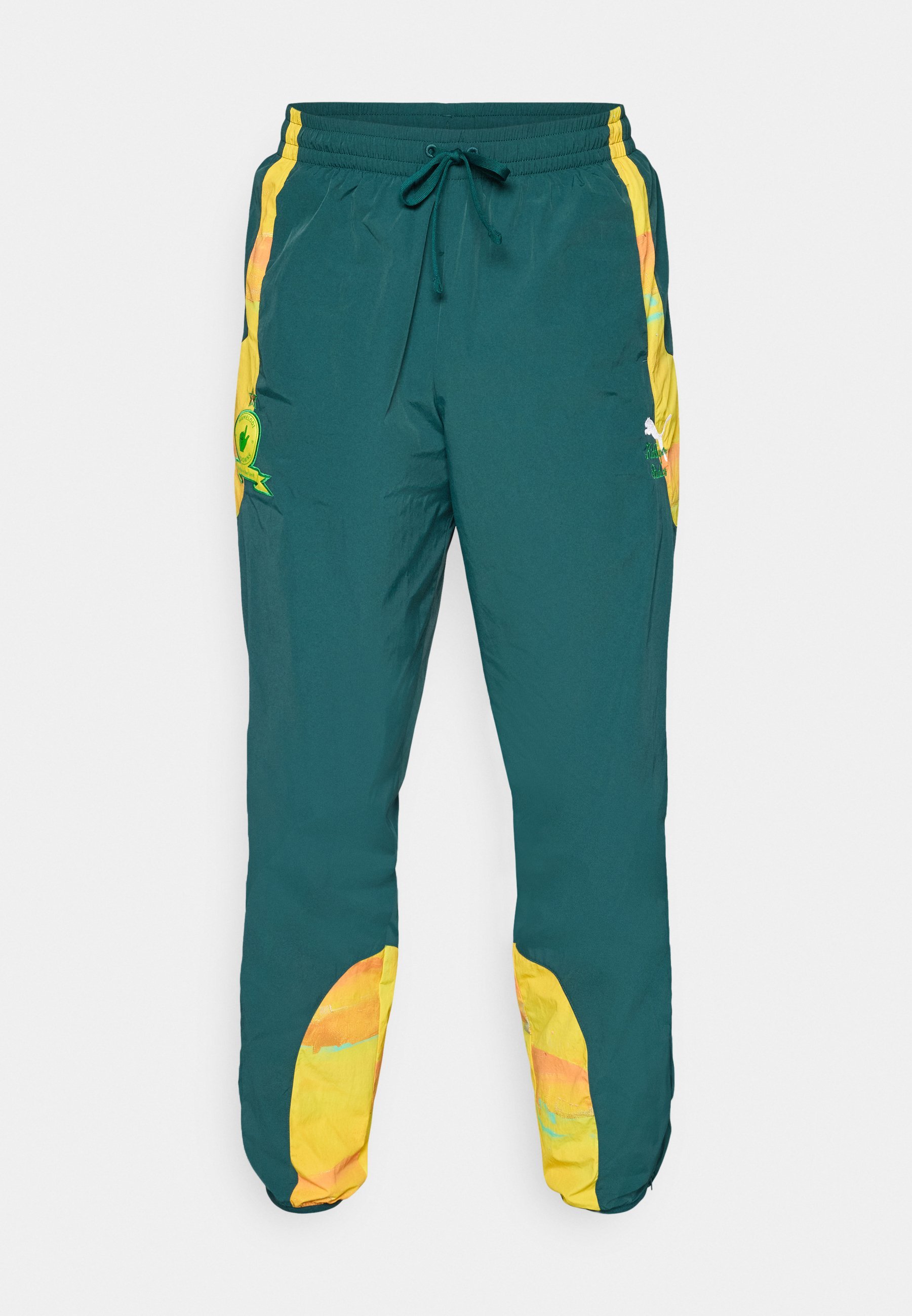 Puma KIDSUPER MAMELODI SUNDOWNS FC TRAVEL PANT - Klubipüksid - terrain green/pelé yellow