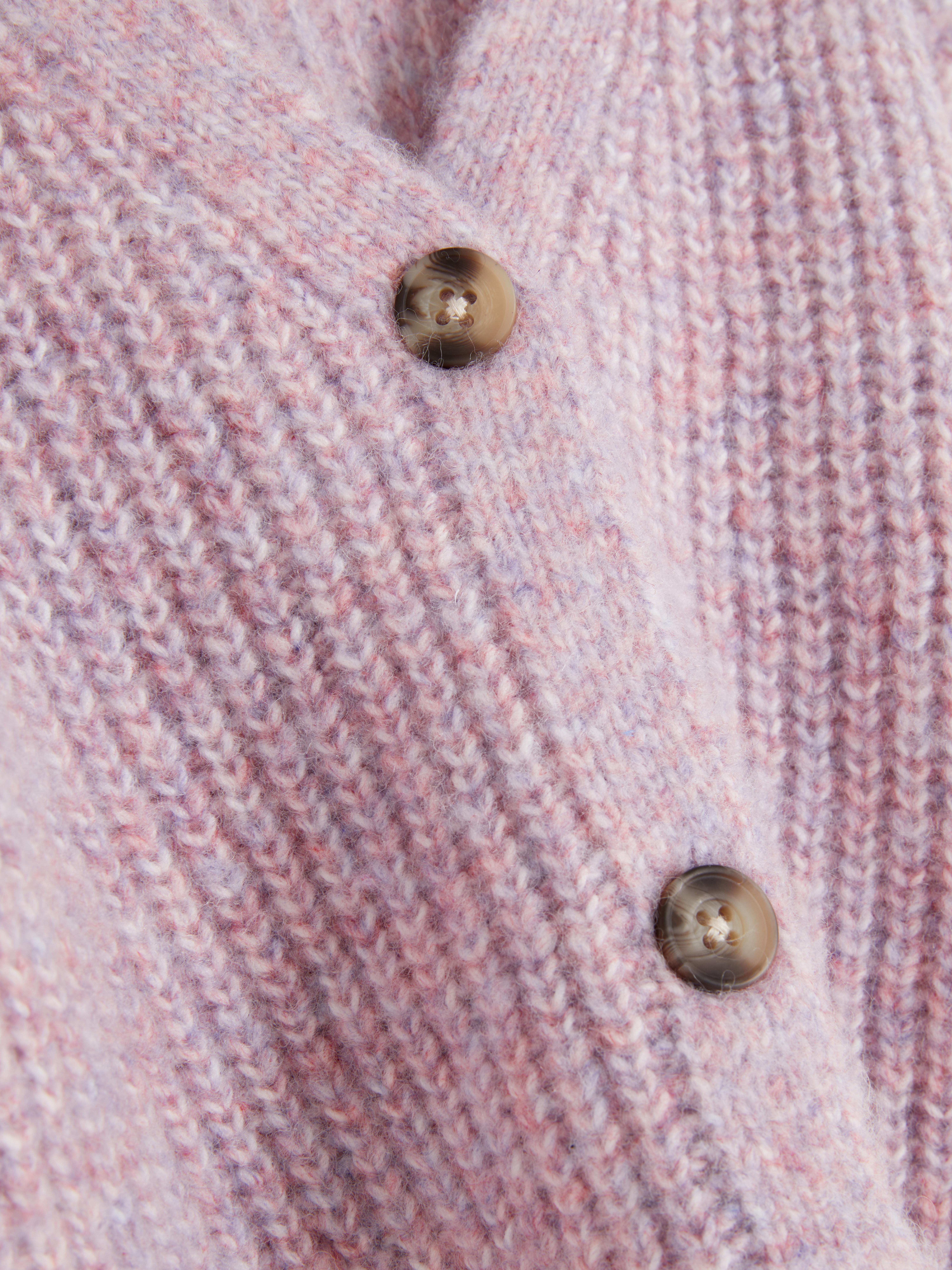 Knitted cardigan with buttons A knitted cardigan with a V-neck and button closure at the front