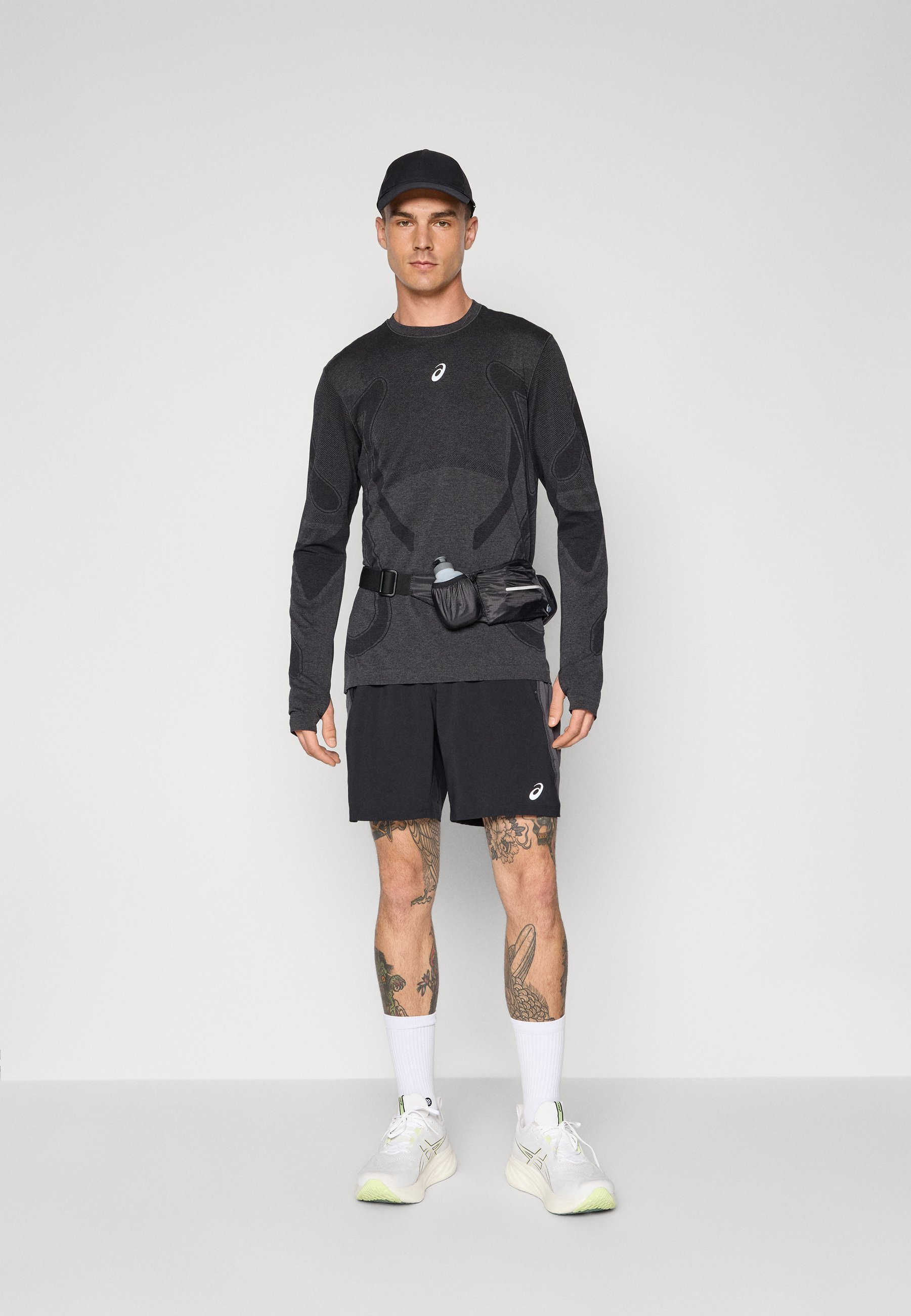 Maglia a maniche lunghe ASICS ROAD SEAMLESS TOP - nera ad alte prestazioni