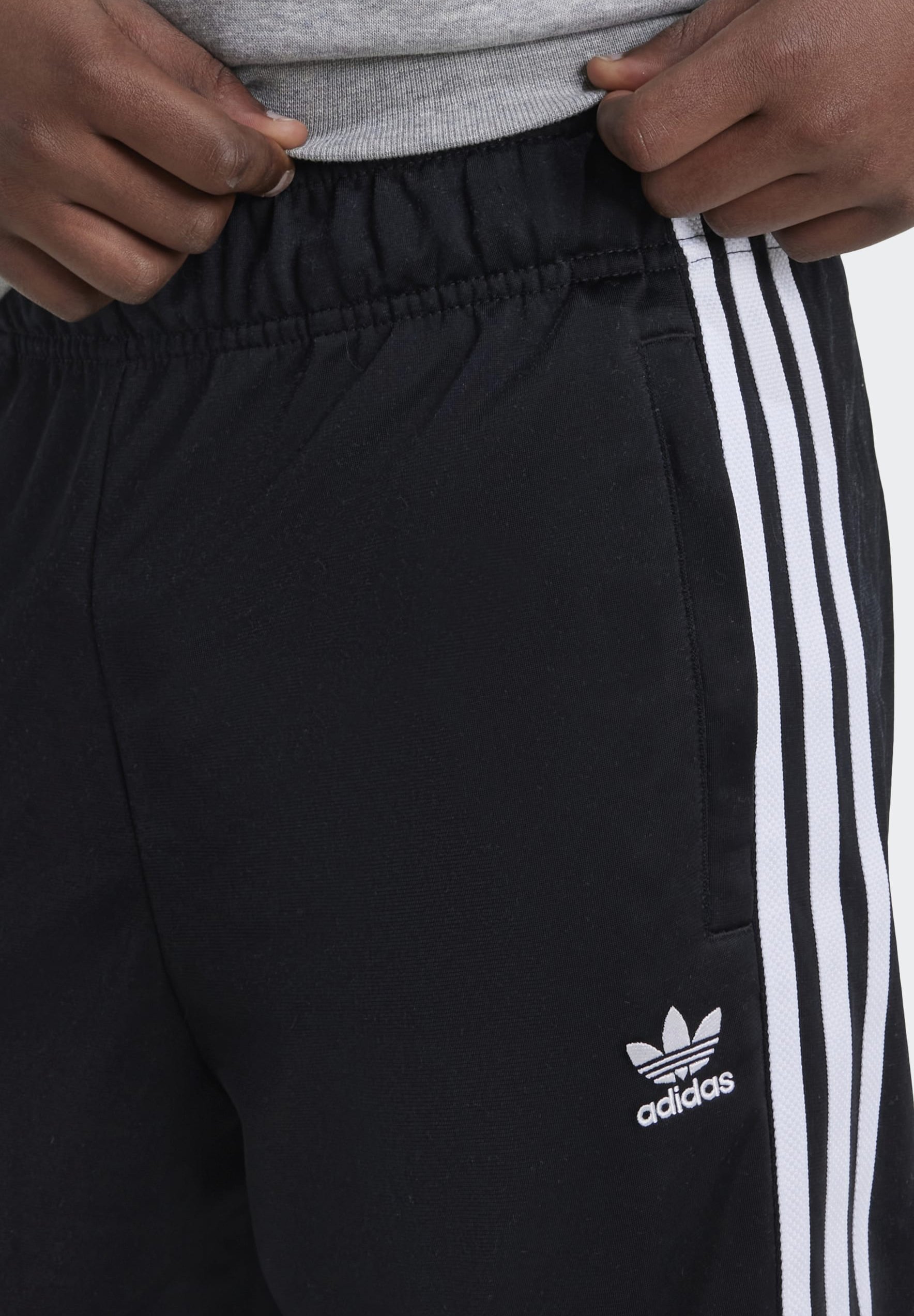 Teplákové kalhoty adidas Originals - černé