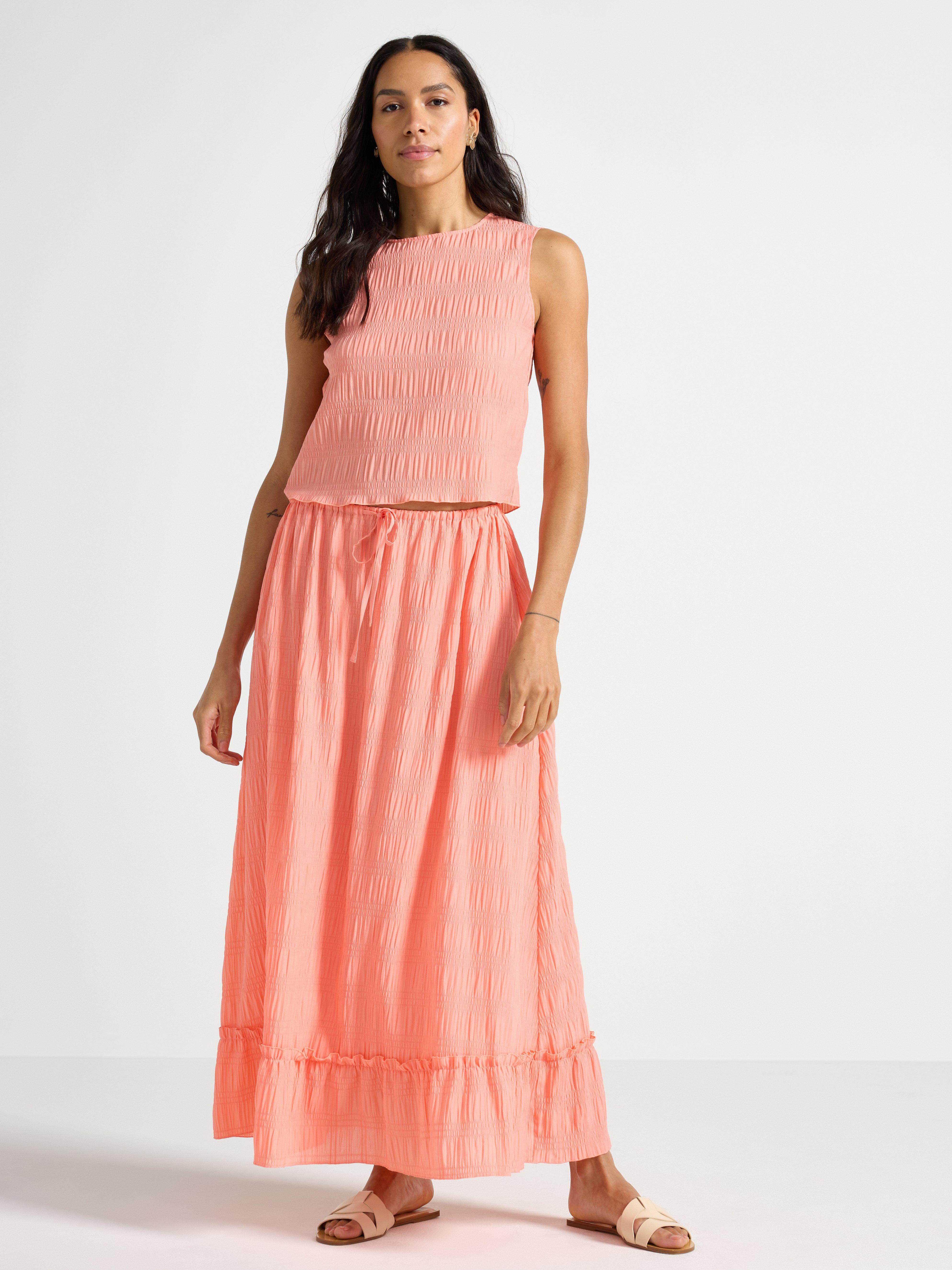 Top sin mangas color coral claro