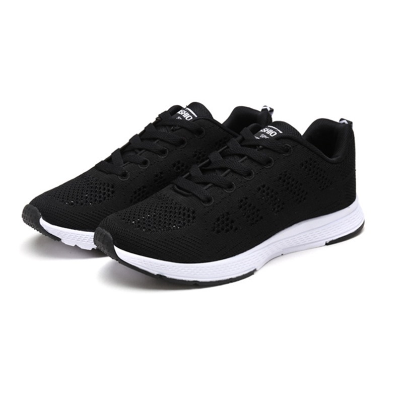 Zapatillas de running para mujer, malla tejida, zapatillas deportivas de moda para hombre, color negro y blanco, antideslizantes y transpirables.
