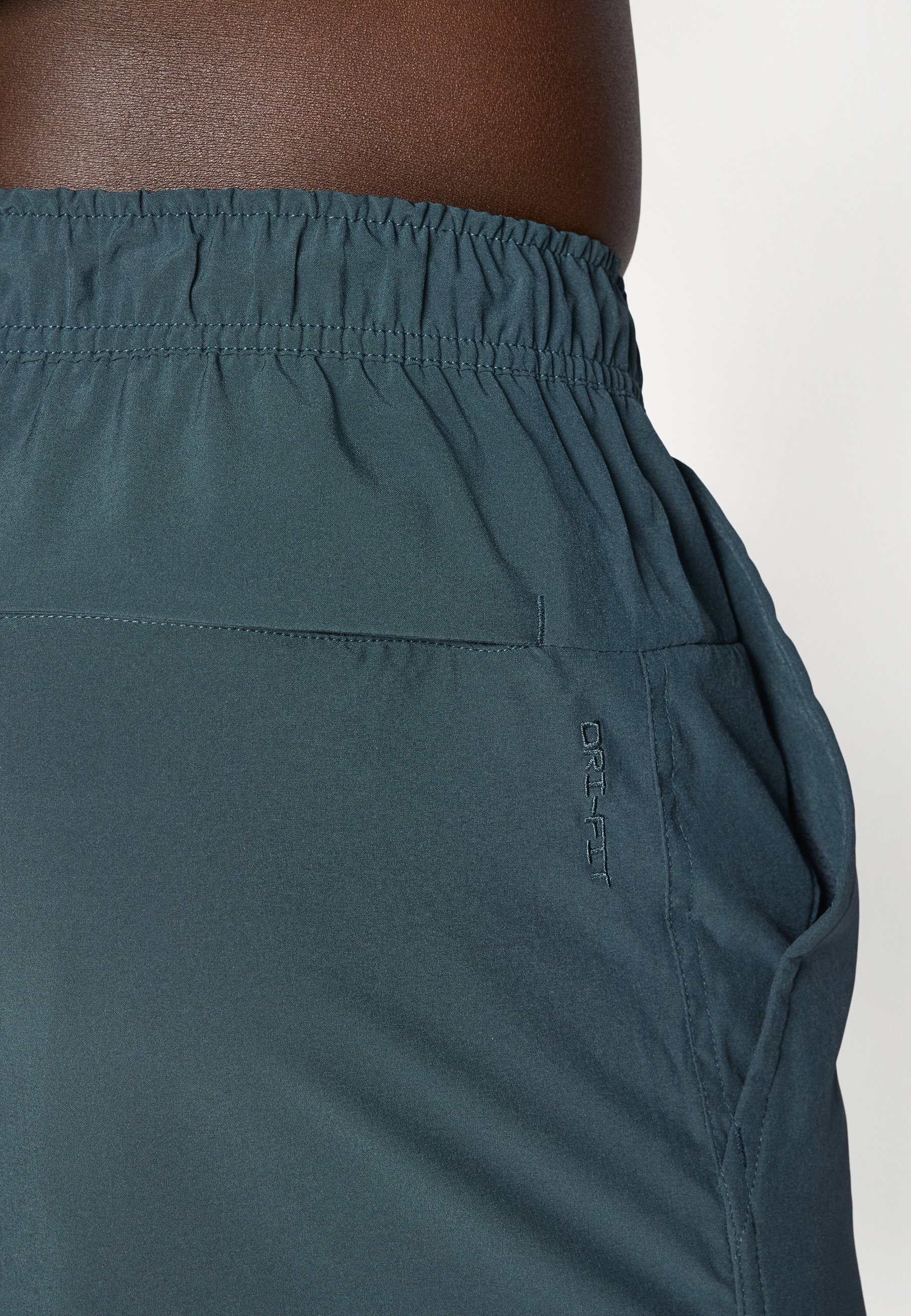 Nike Performance UNLIMITED – Spodenki sportowe – wodorosty/czarne