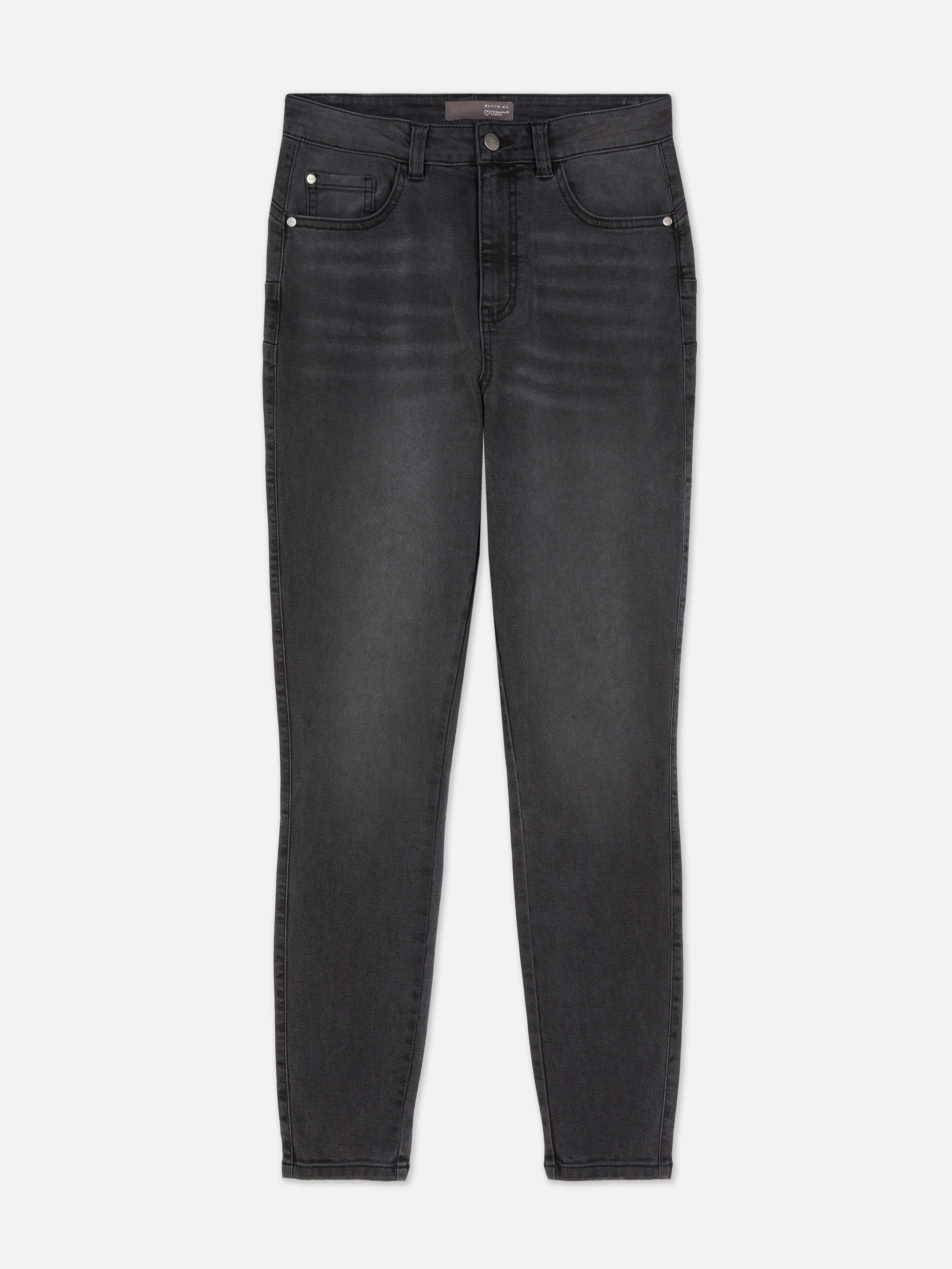 Jeans skinny modellanti. Jeans skinny con passanti per cintura, chiusura con bottone e dettagli sulle tasche.