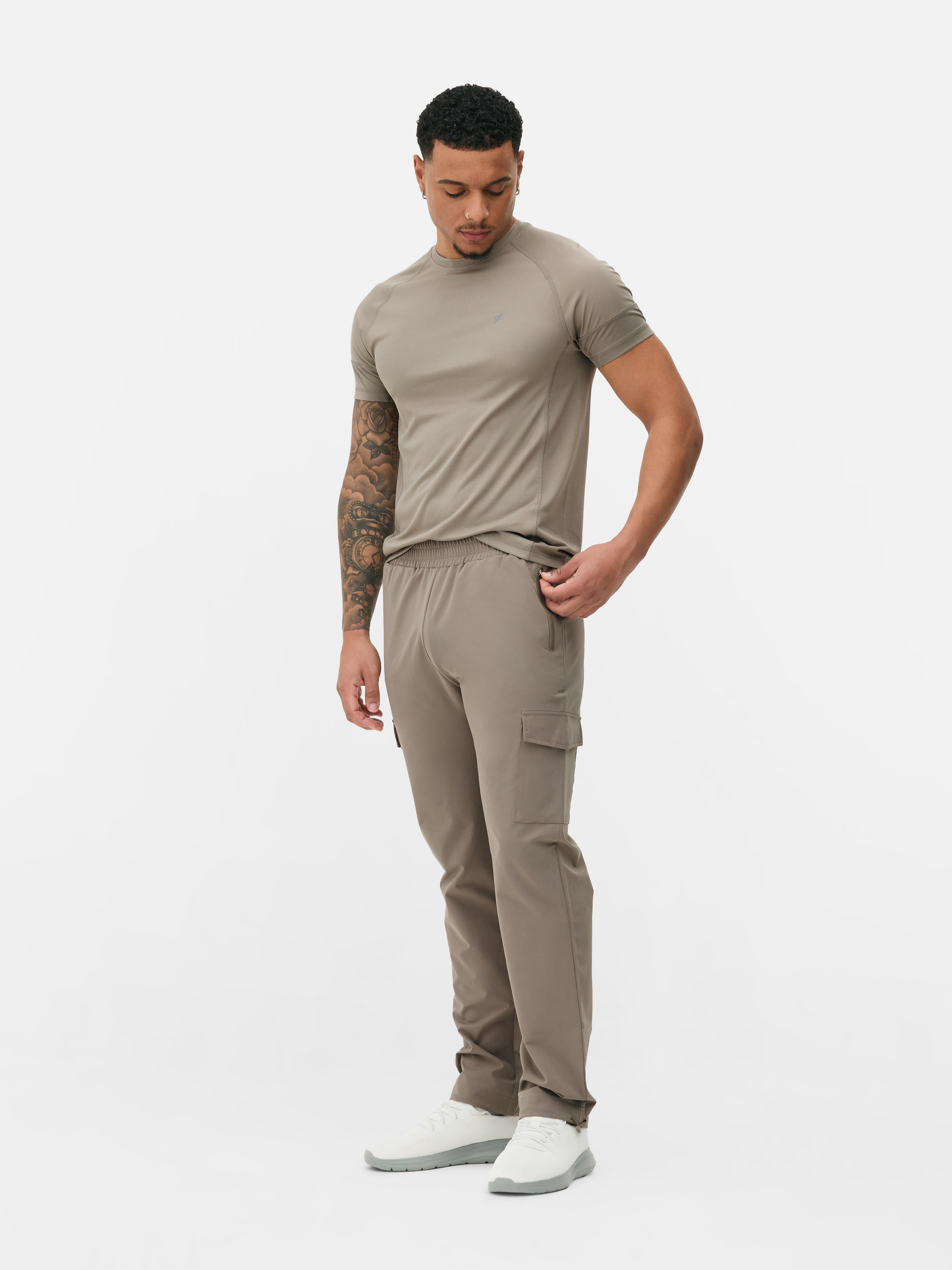 Woven cargo sweatpants Woven sweatpants with stretchy waist, cargo pockets and adjustable ankle cuffs