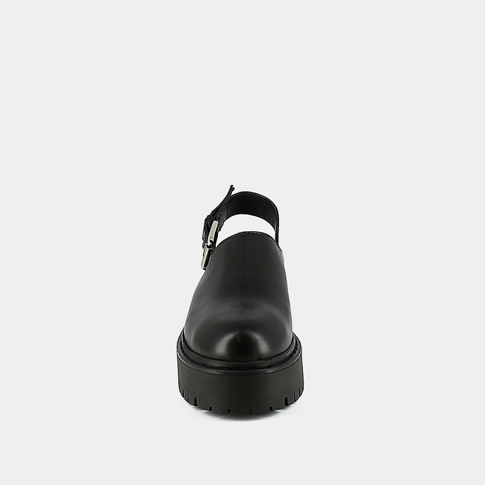 Mules à semelles crantées  en cuir noir