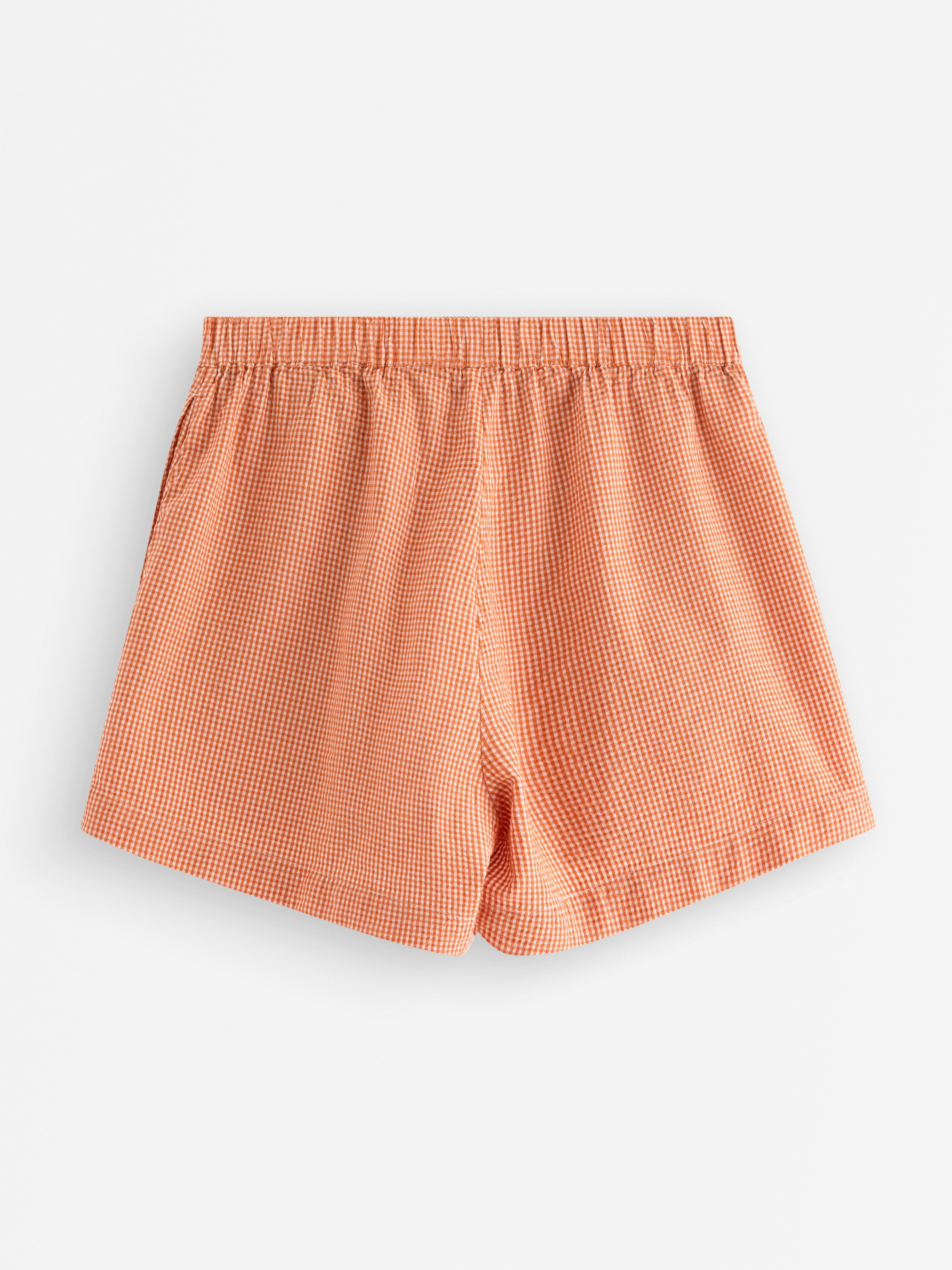 Pyžamové kraťasy Dusty Orange s vlnovkou potoka