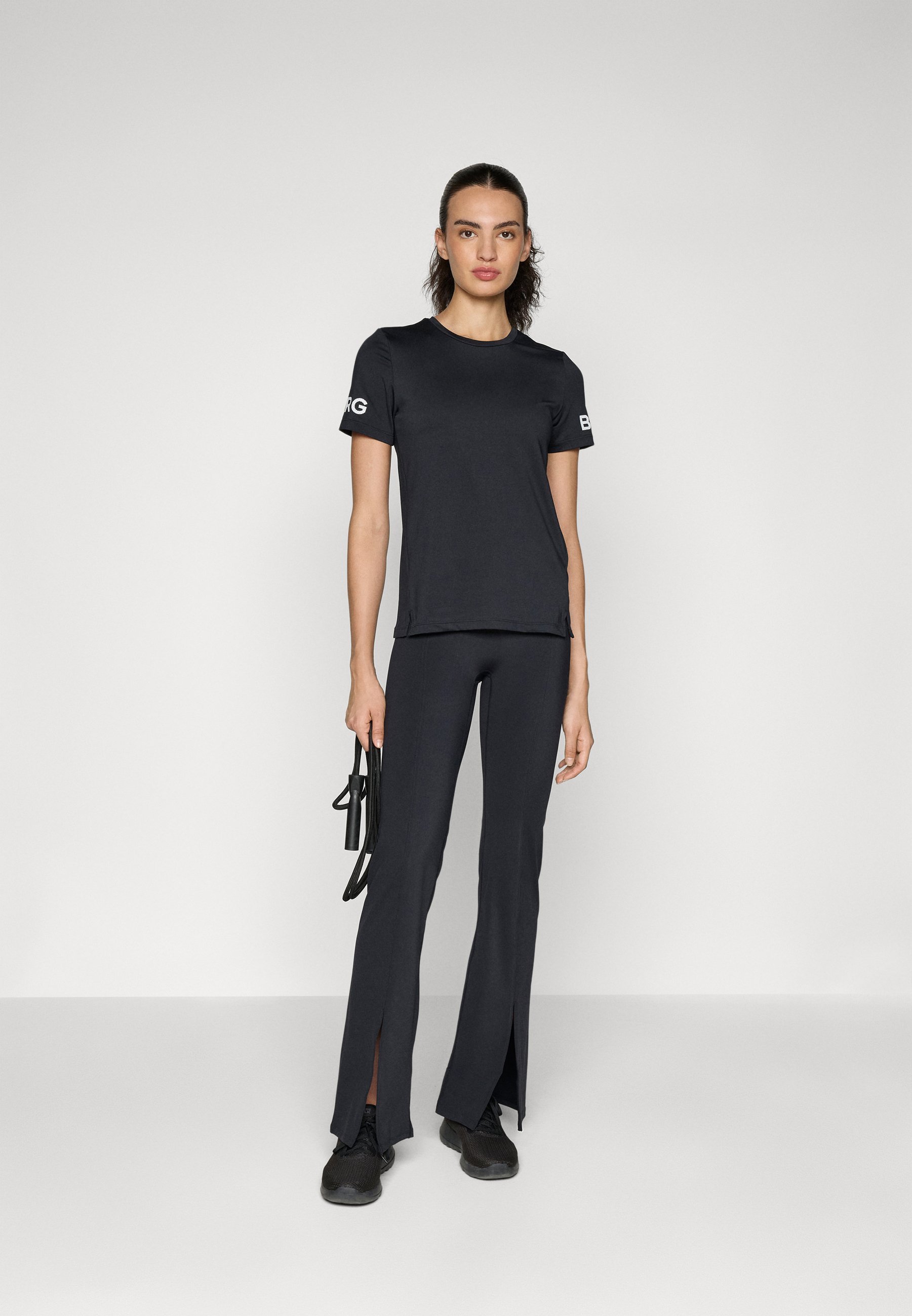 Björn Borg STUDIO FLARED SLIT - Leggings - black beauty