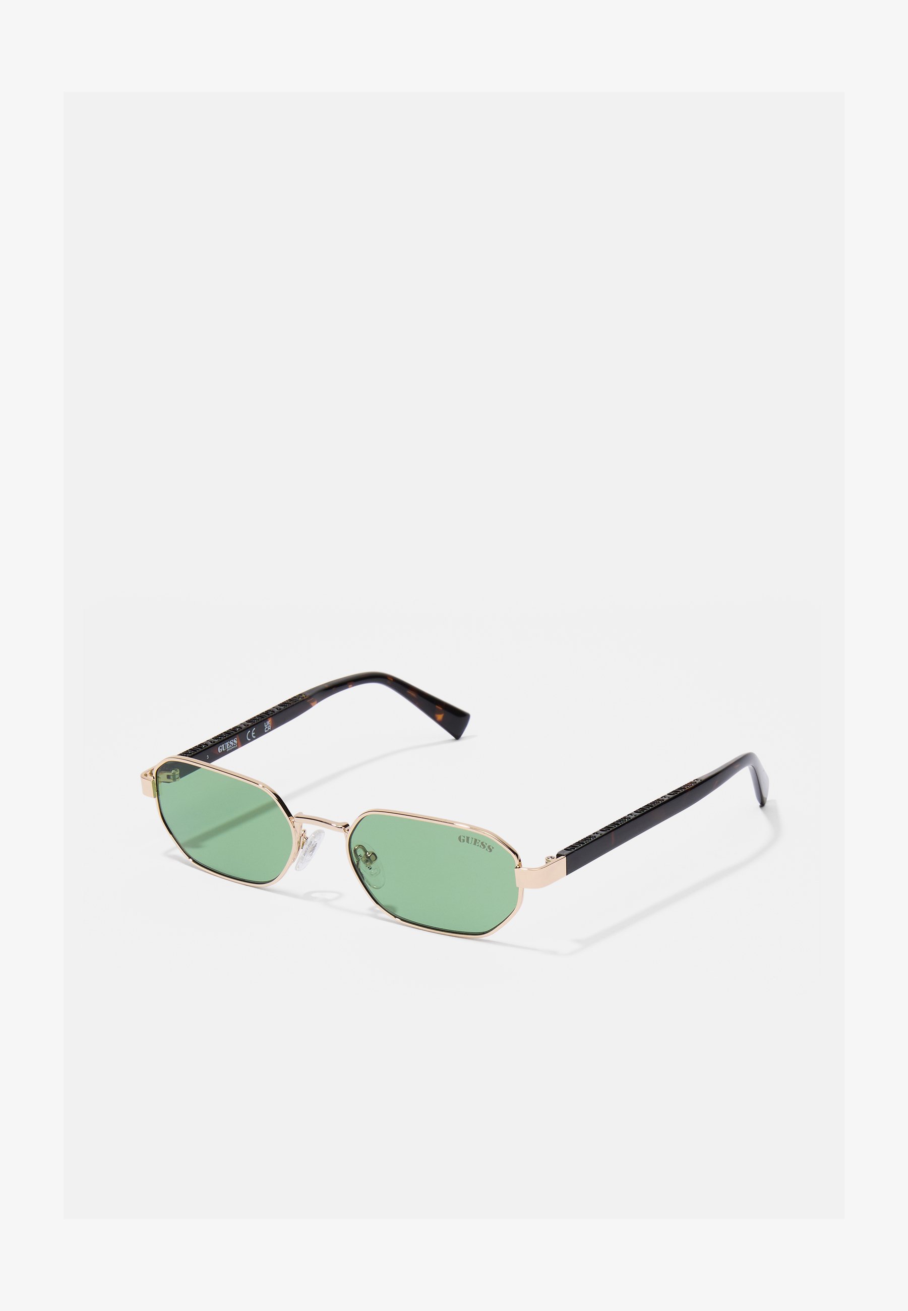 Guess UNISEX - Zonnebril - goudkleurig