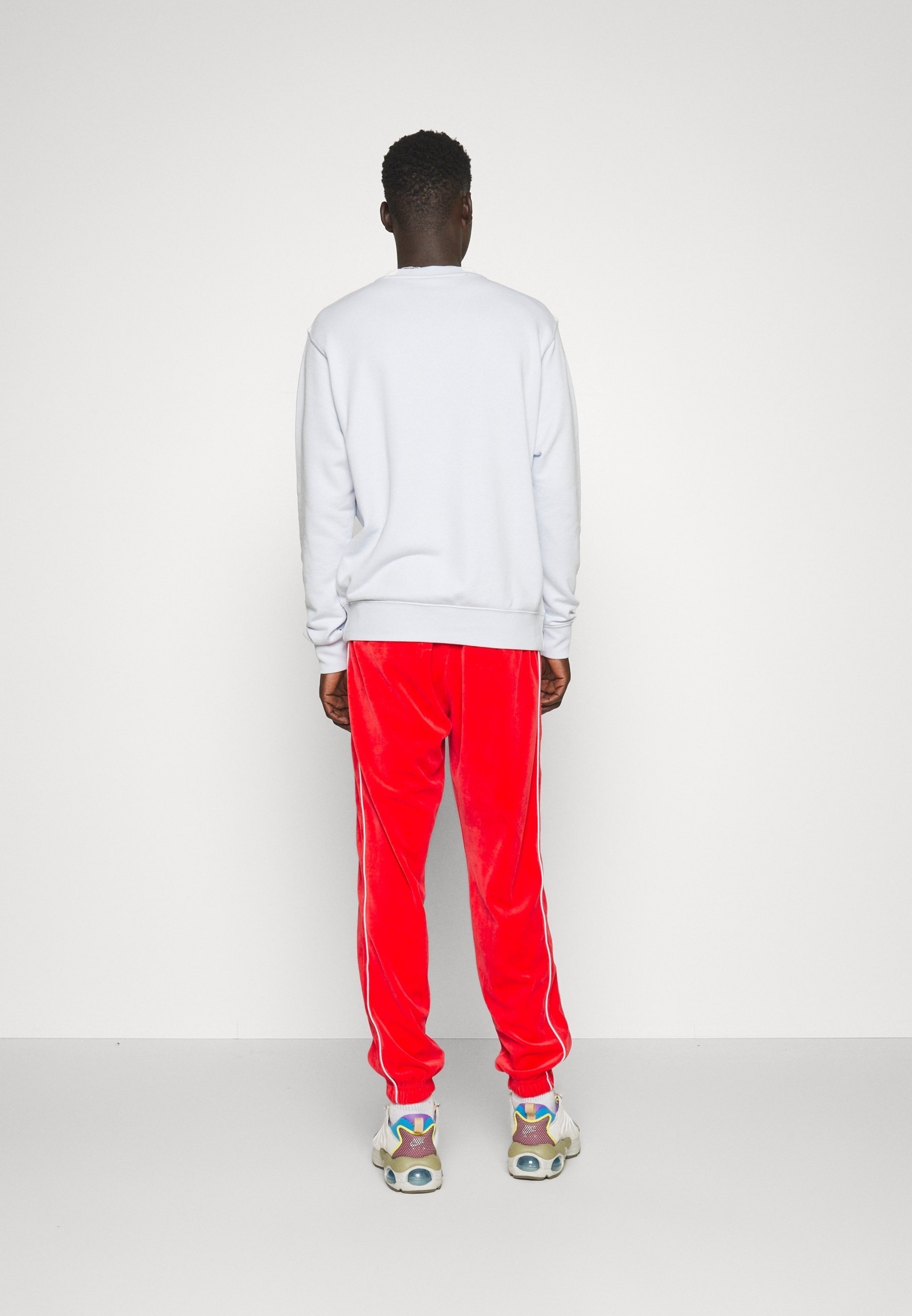 Nike Sportswear trainingsbroek - rood