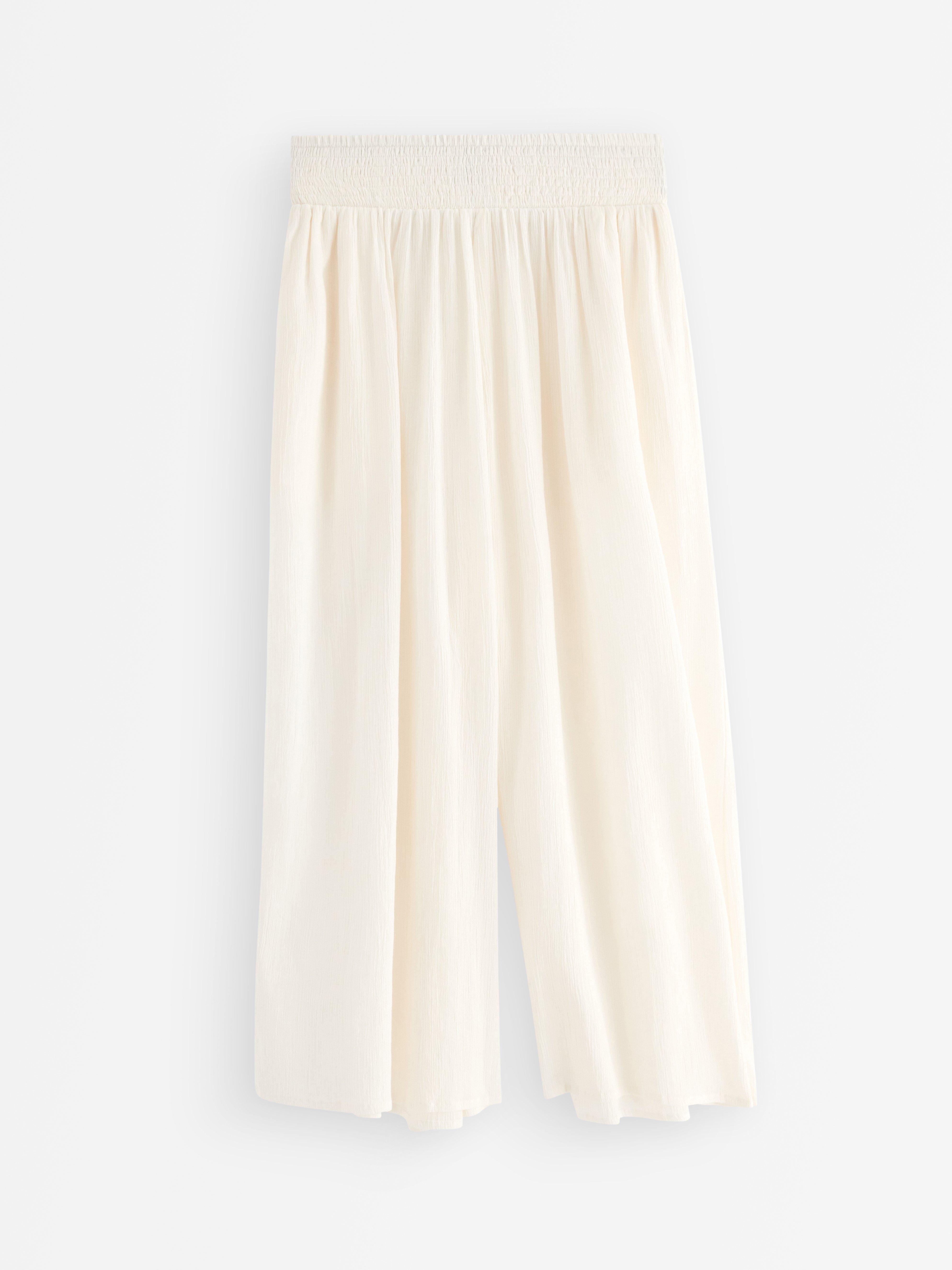 Pantalones anchos cortos blancos