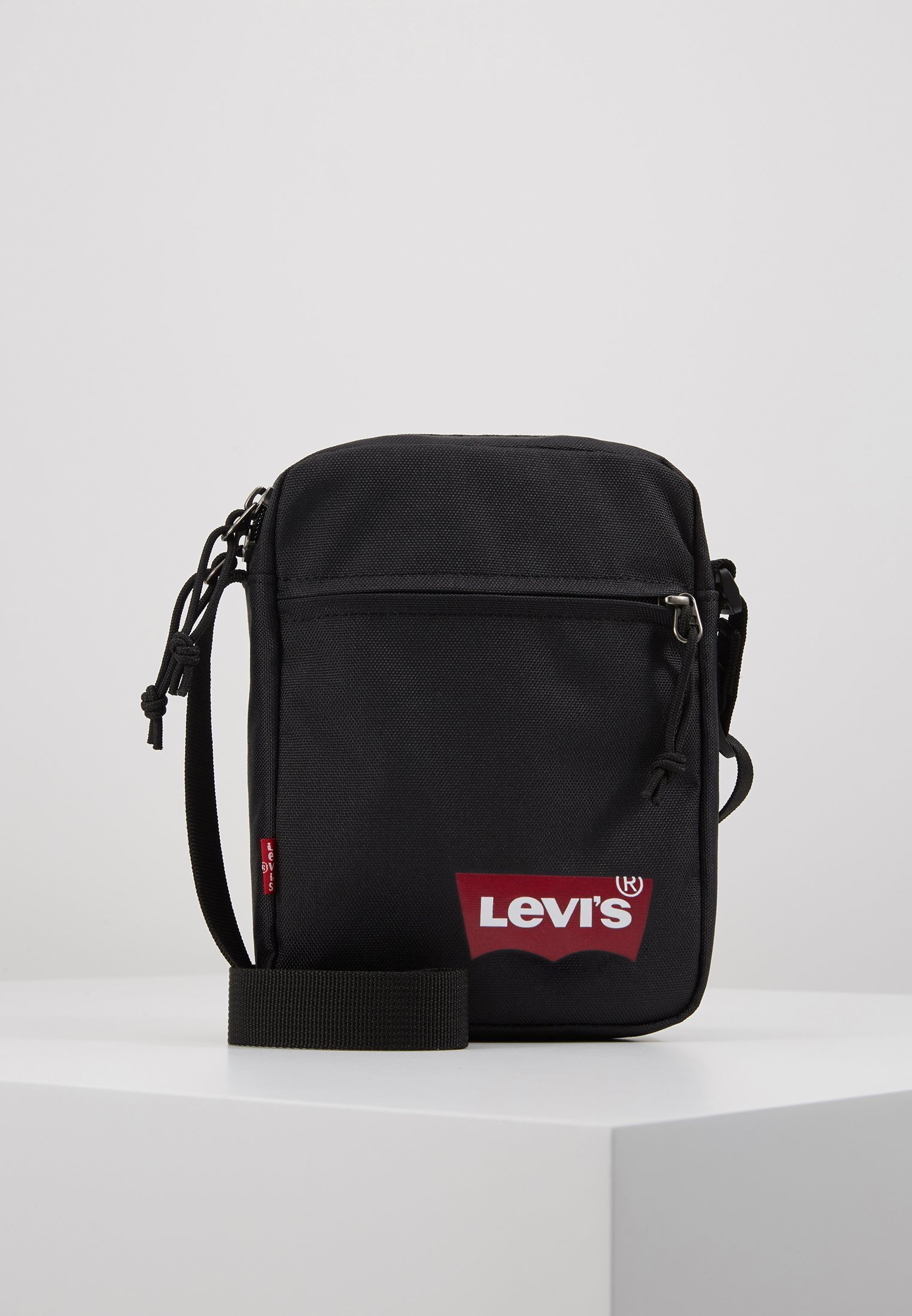 Bolsa transversal Levi's® MINI CROSSBODY SOLID BATWING UNISSEX - preta - tamanho regular