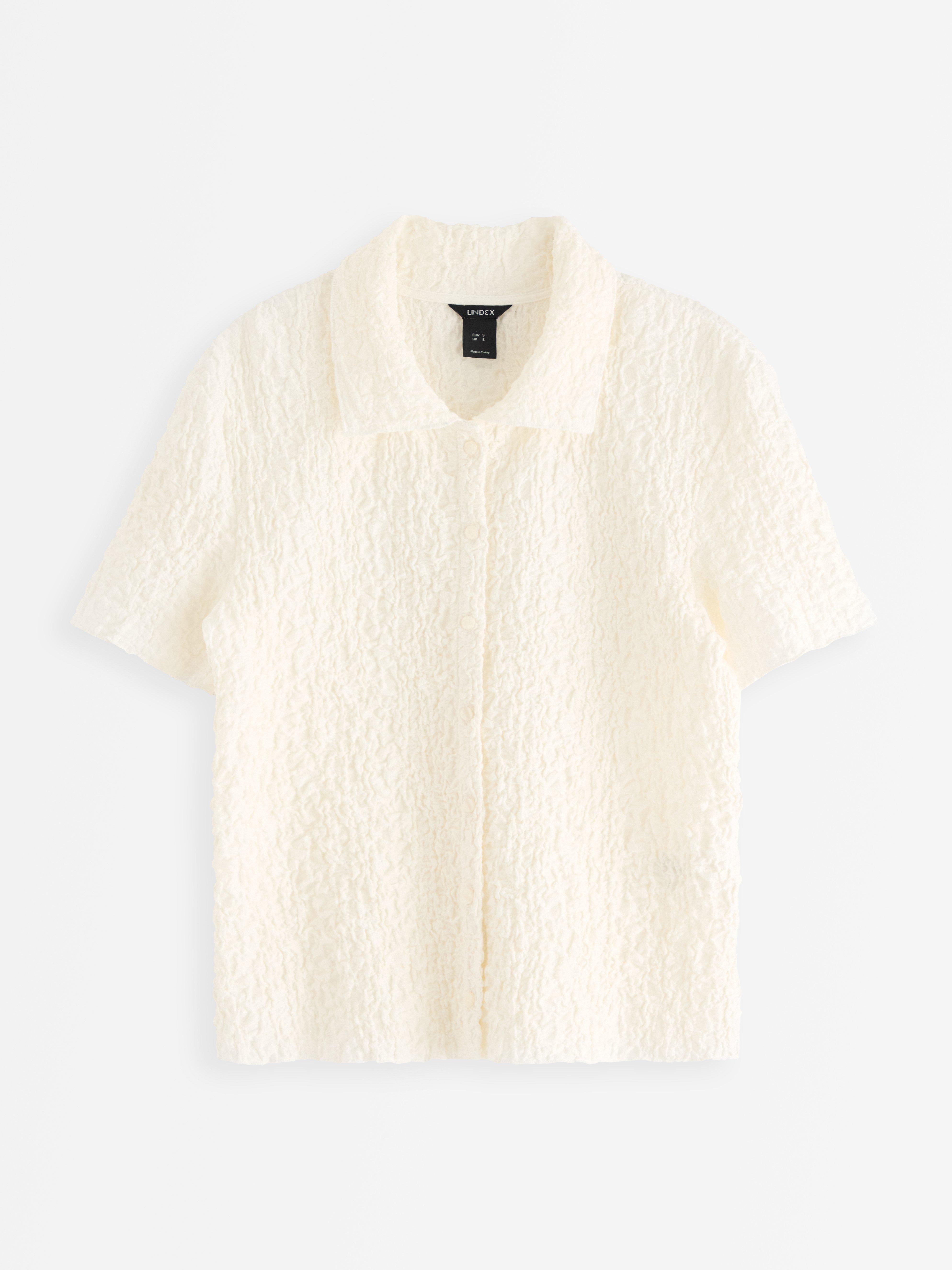 Camisa amassada branca