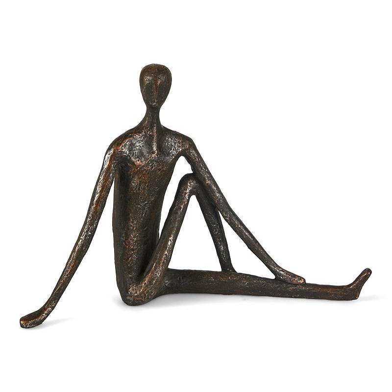 Figura de yoga para el hogar con acabado bronce.