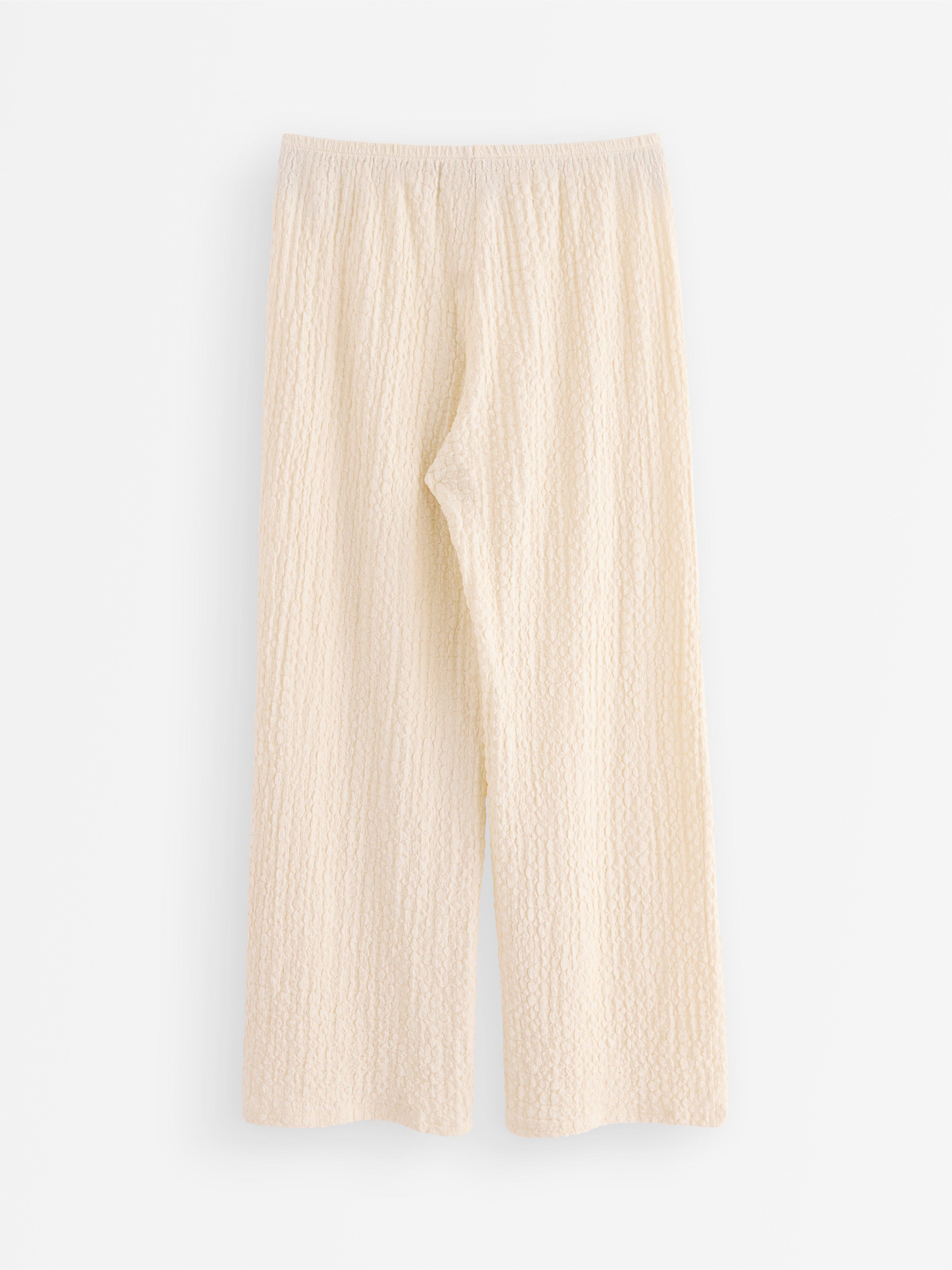 LYKKE Los pantalones anchos Blanco roto