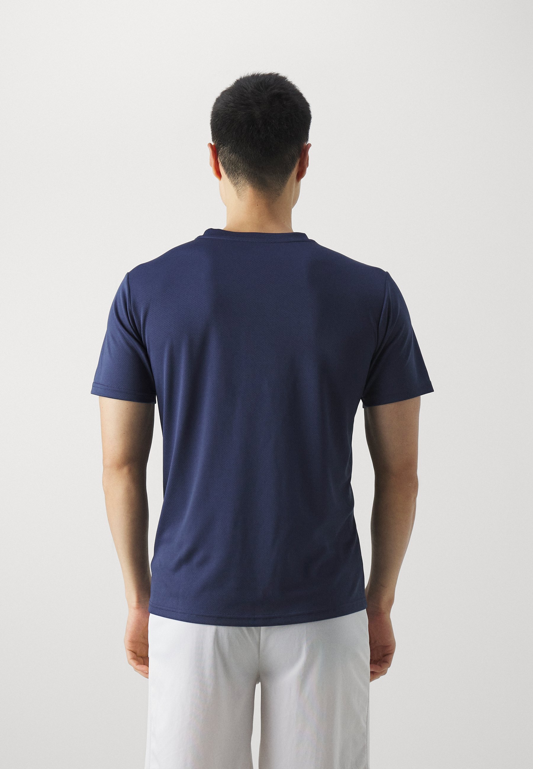 Puma TEAMGOAL - Sport T-shirt - marineblauw/wit/Perzisch blauw