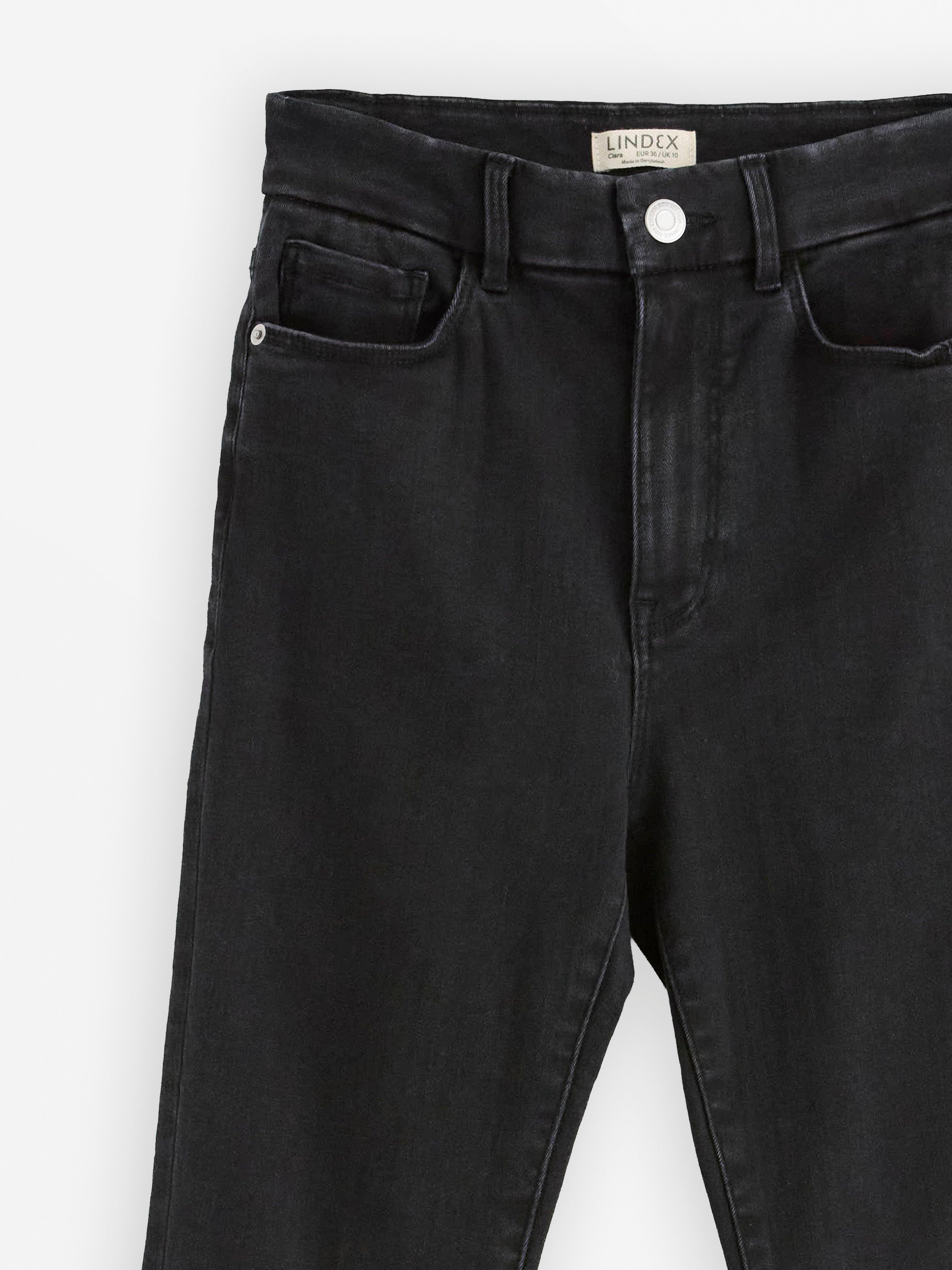 Calça jeans SLIM Clara superstretch, tamanho médio-alto, preta.
