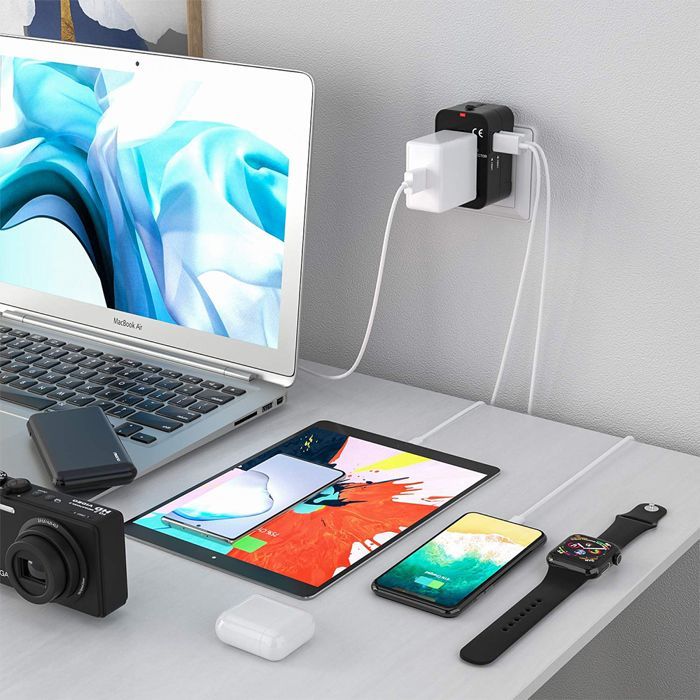 Adaptador de viaje - JESWO - Universal - 2 puertos USB - Ignífugo - 200 países