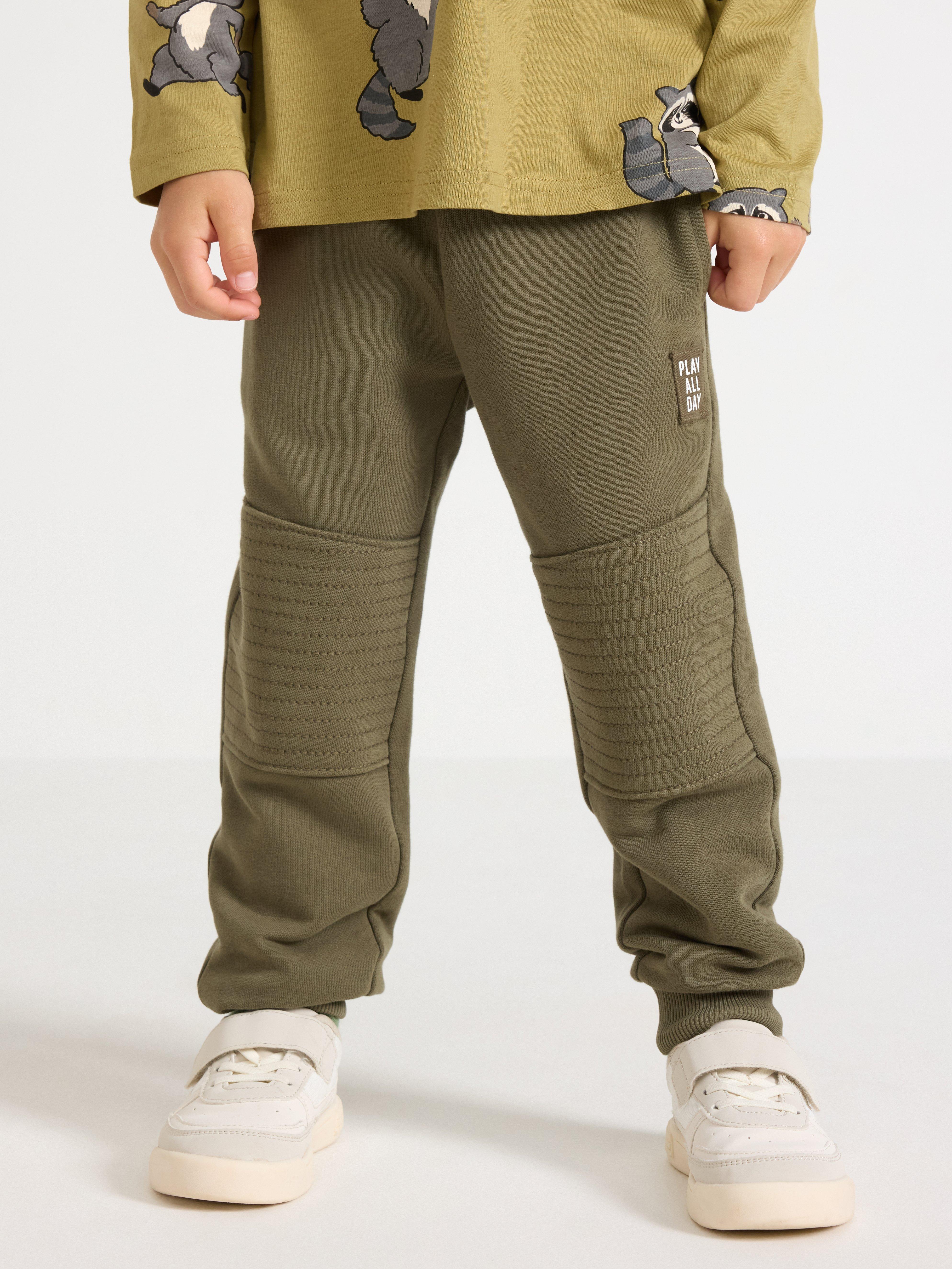 Pantalones deportivos con rodillas reforzadas
