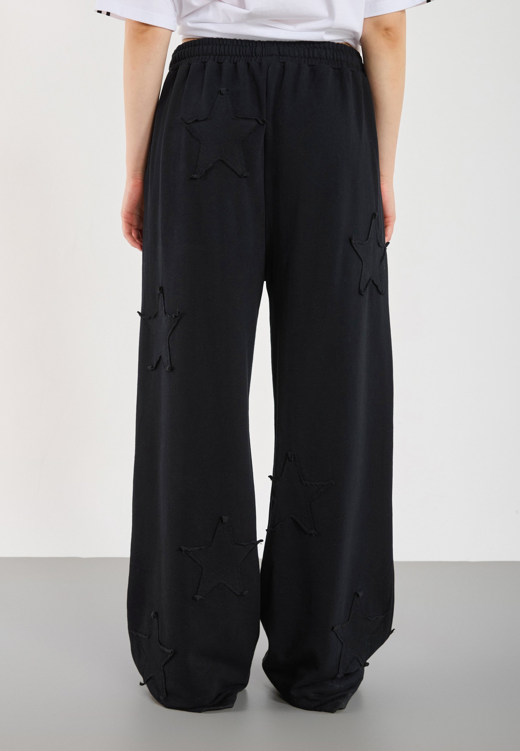YOURTURN UNISEX - Trainingsbroek - zwart