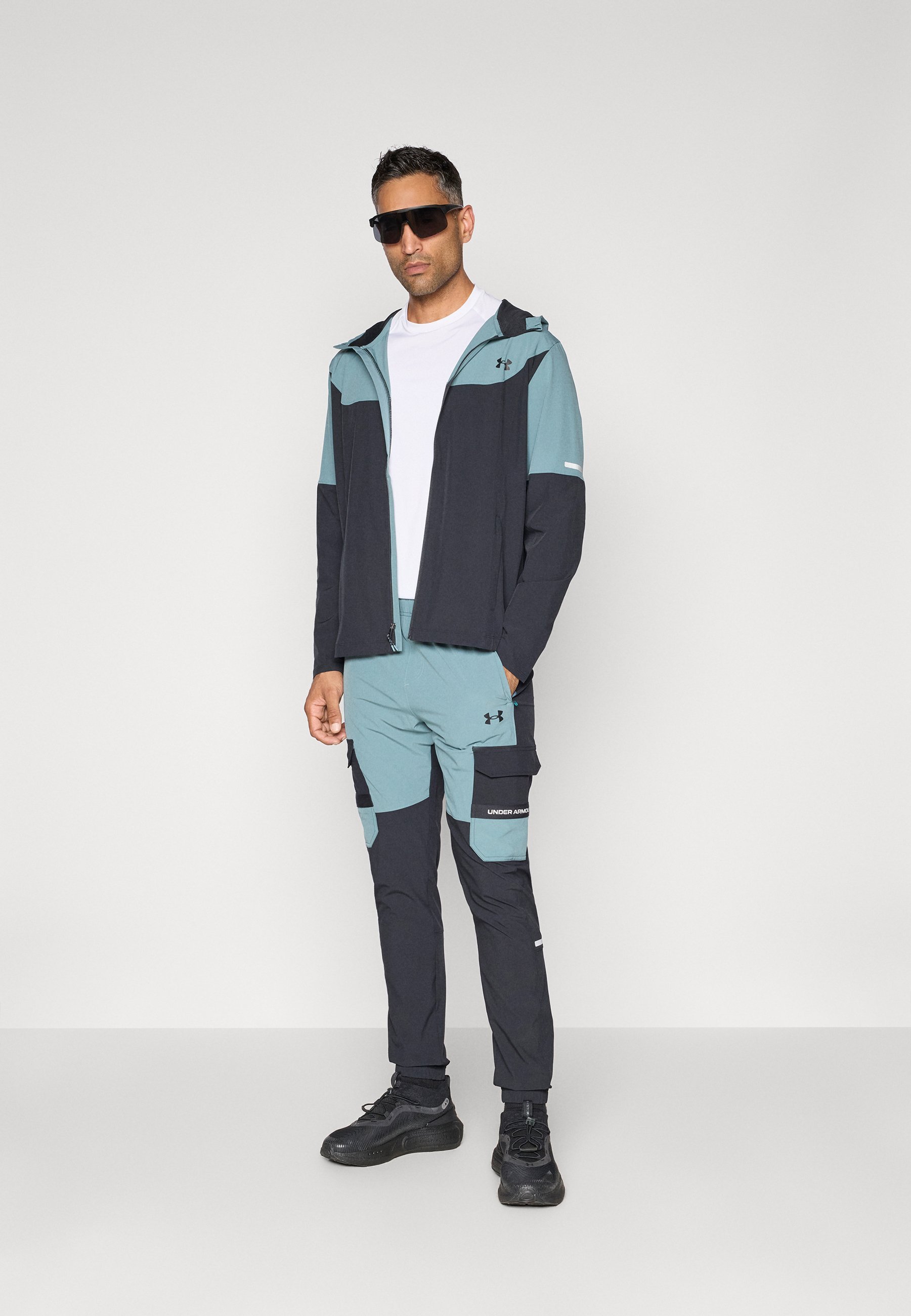 Pantaloni Under Armour UTILITY - Pantaloni da tuta - nero/blu diaspro