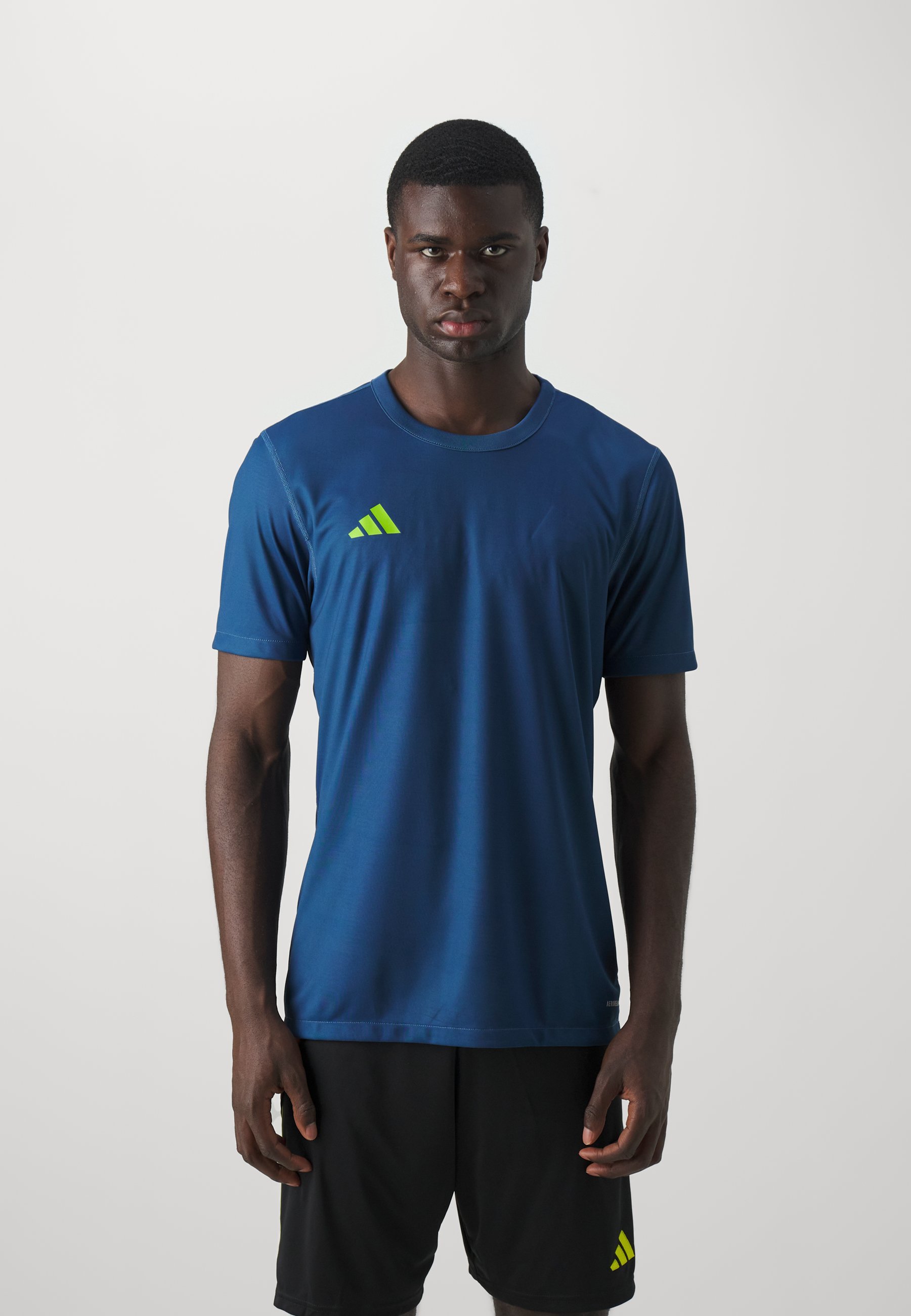 adidas Performance REV 24 JERSEY - Sport T-shirt - team marineblauw/team semi-groen