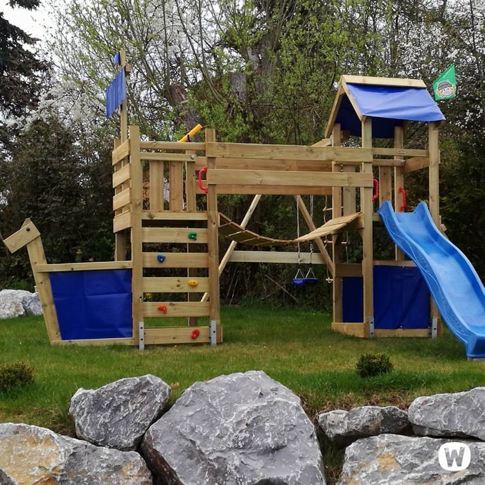 WICKEY StormFlyer speeltoestel in bootvorm van hout met een pastelblauwe glijbaan van 220 cm en een klimwand – 10 jaar garantie*