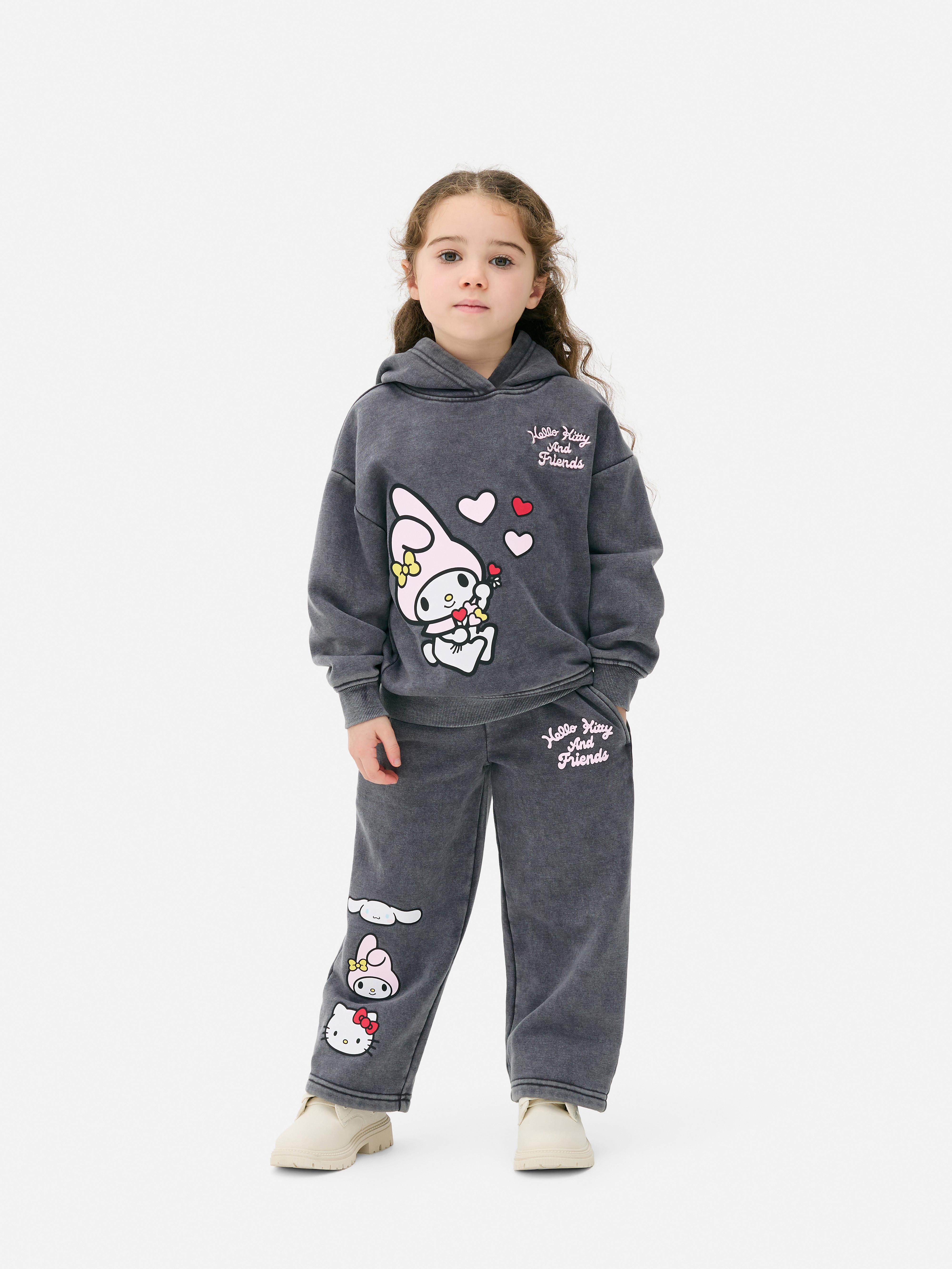 Felpa con cappuccio effetto acid wash abbinata Hello Kitty e amici. Una felpa con cappuccio effetto acid wash con stampa, ampio cappuccio, polsini a coste e design Sanrio.