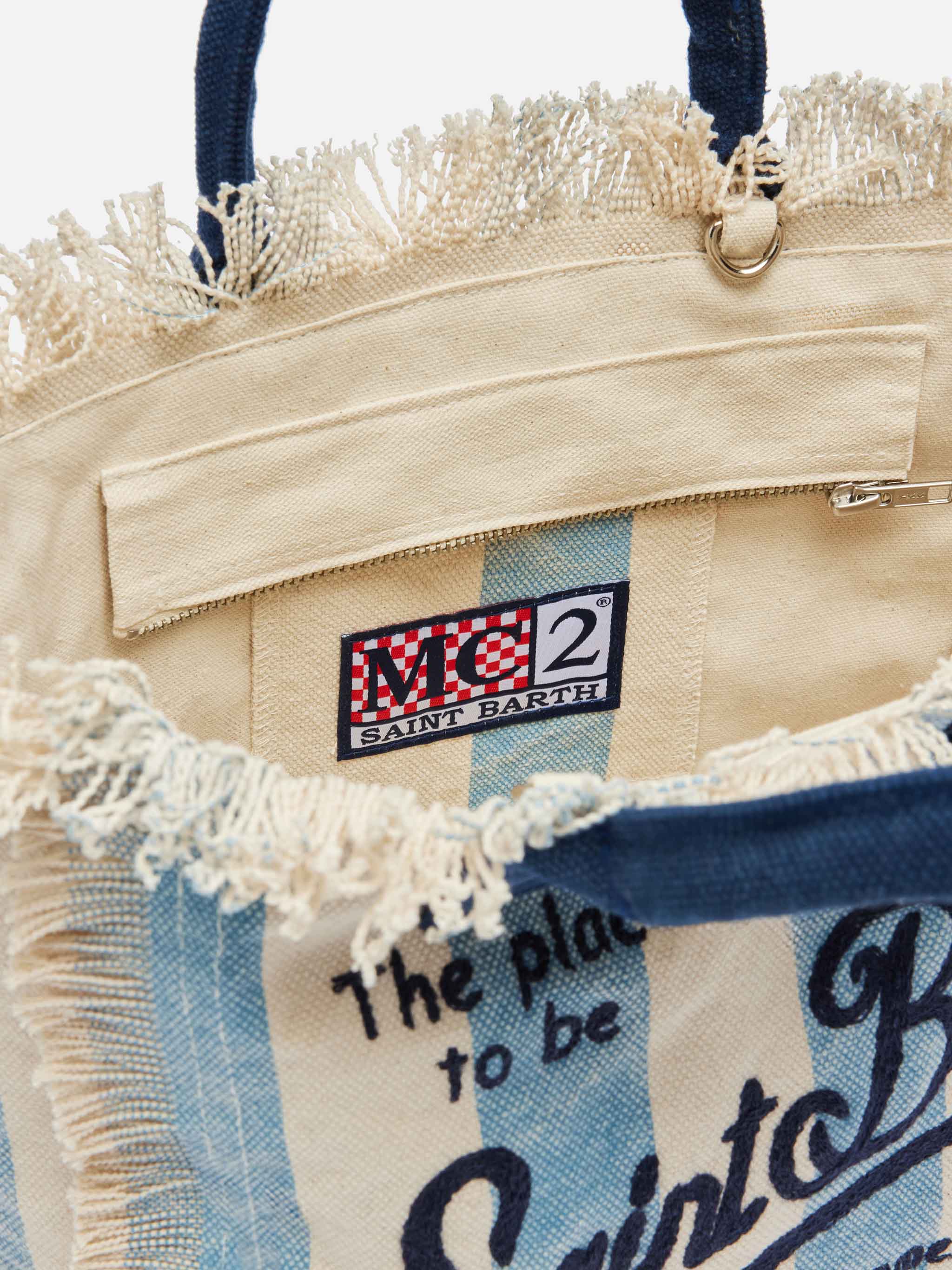 Bolsa Colette em lona de algodão com estampa listrada azul.