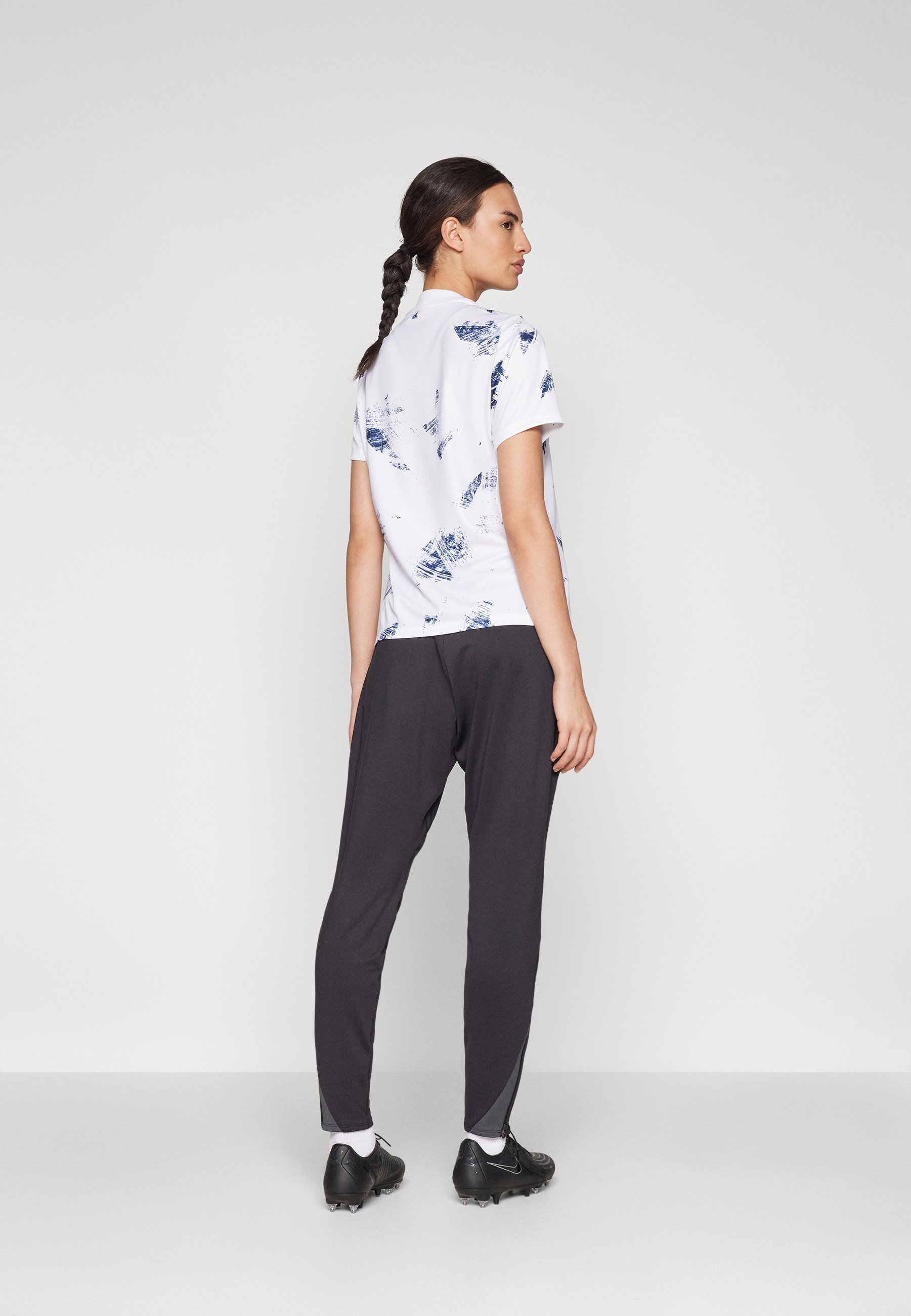 Pantaloni da tuta Nike Performance NIKE STRIKE - nero/antracite/bianco