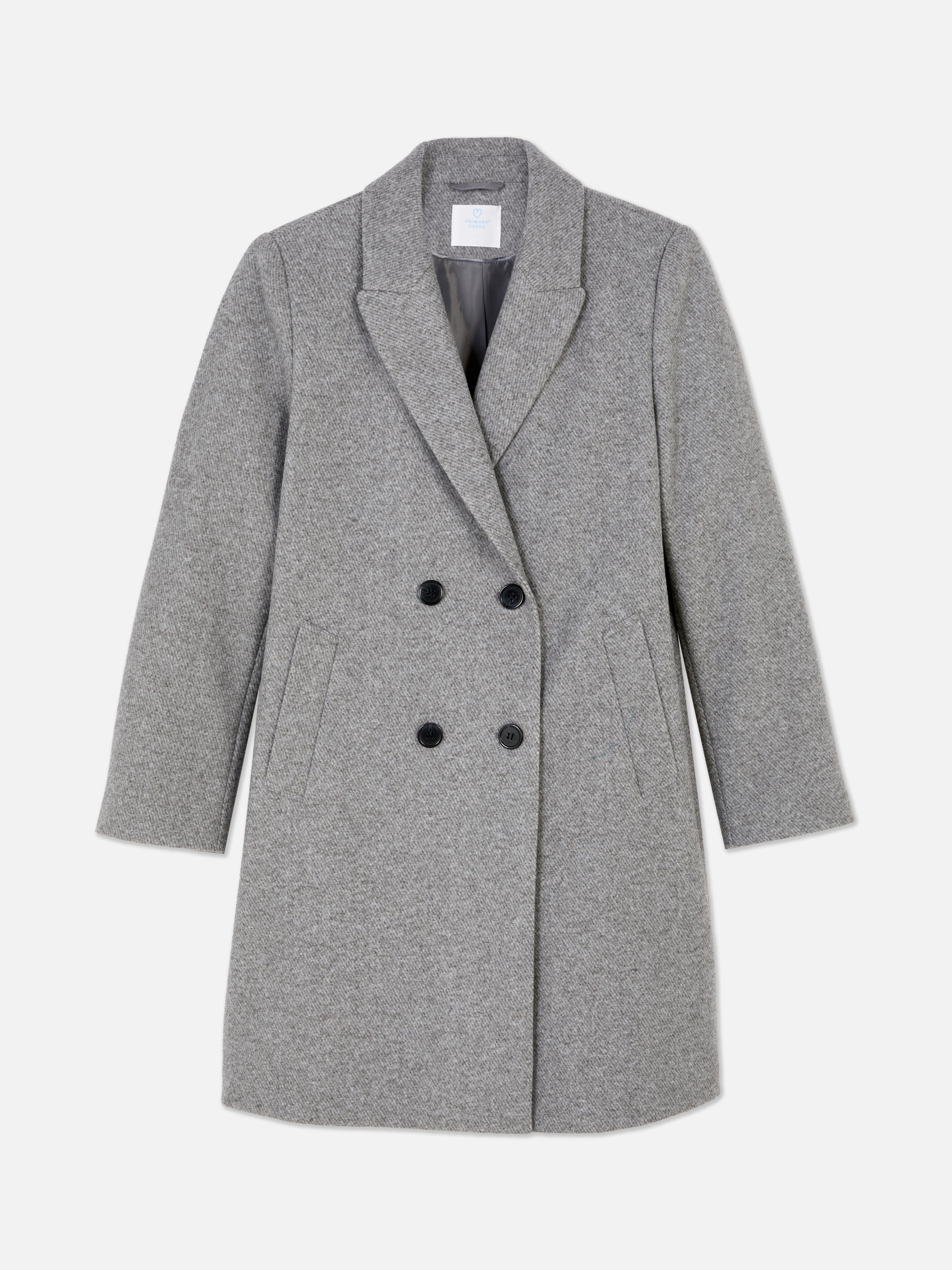 Palton twill cu două rânduri de nasturi. Acest palton twill cu două rânduri de nasturi, cu o croială modernă și revere crestate, este perfect pentru ținute casual sau elegante.