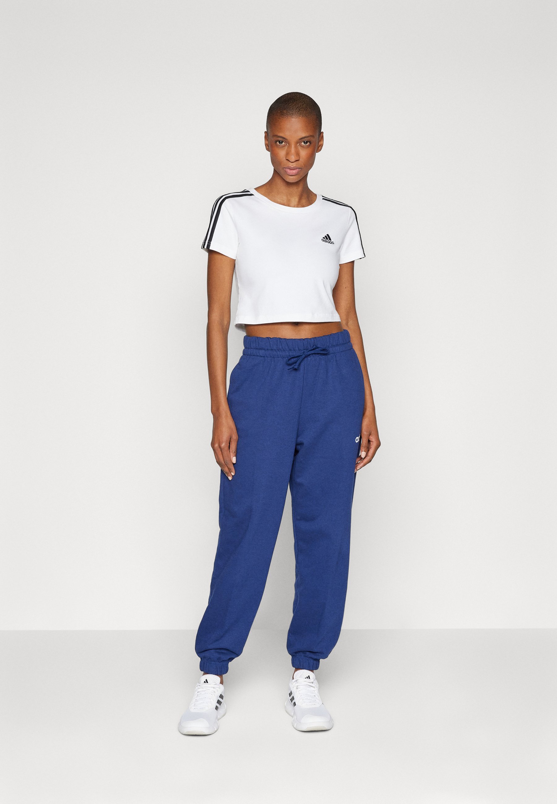 Spodnie dresowe adidas Sportswear - granatowo-białe