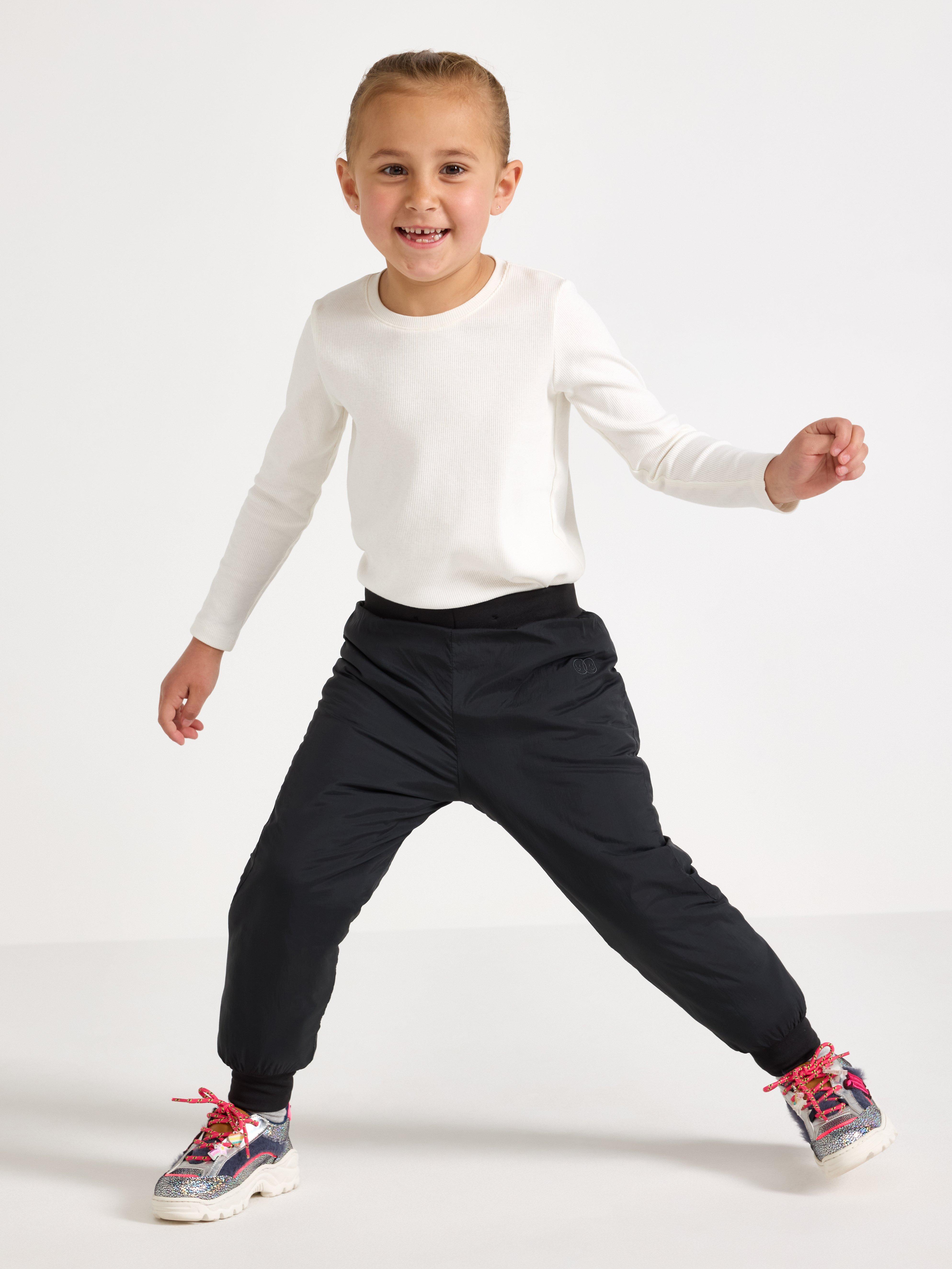 Pantalones ligeros, acolchados e impermeables – Ropa deportiva infantil negra