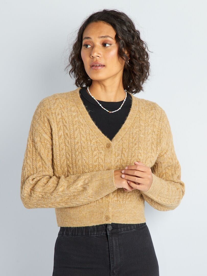 Gebreid vest met gedraaide details - BEIGE