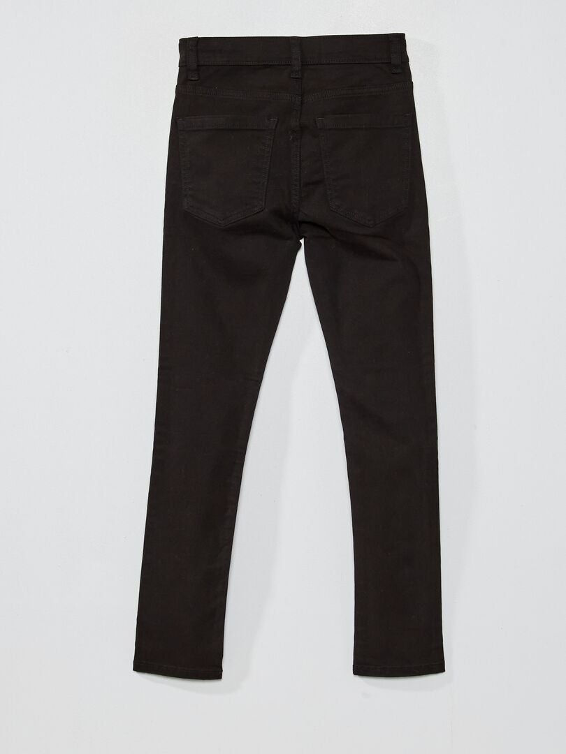 Calça skinny de cinco bolsos - preta