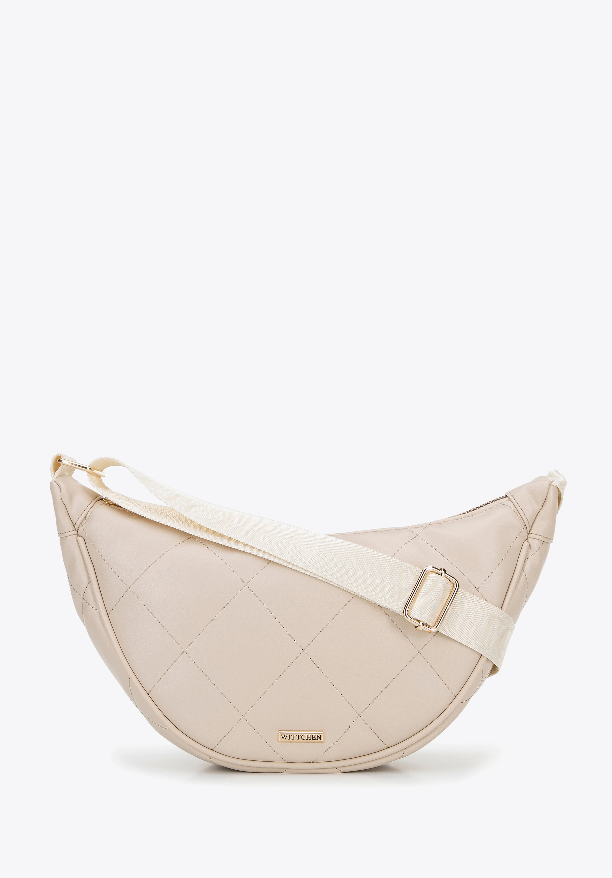 Damska torebka crossbody w geometryczne przeszycia kremowo - złota