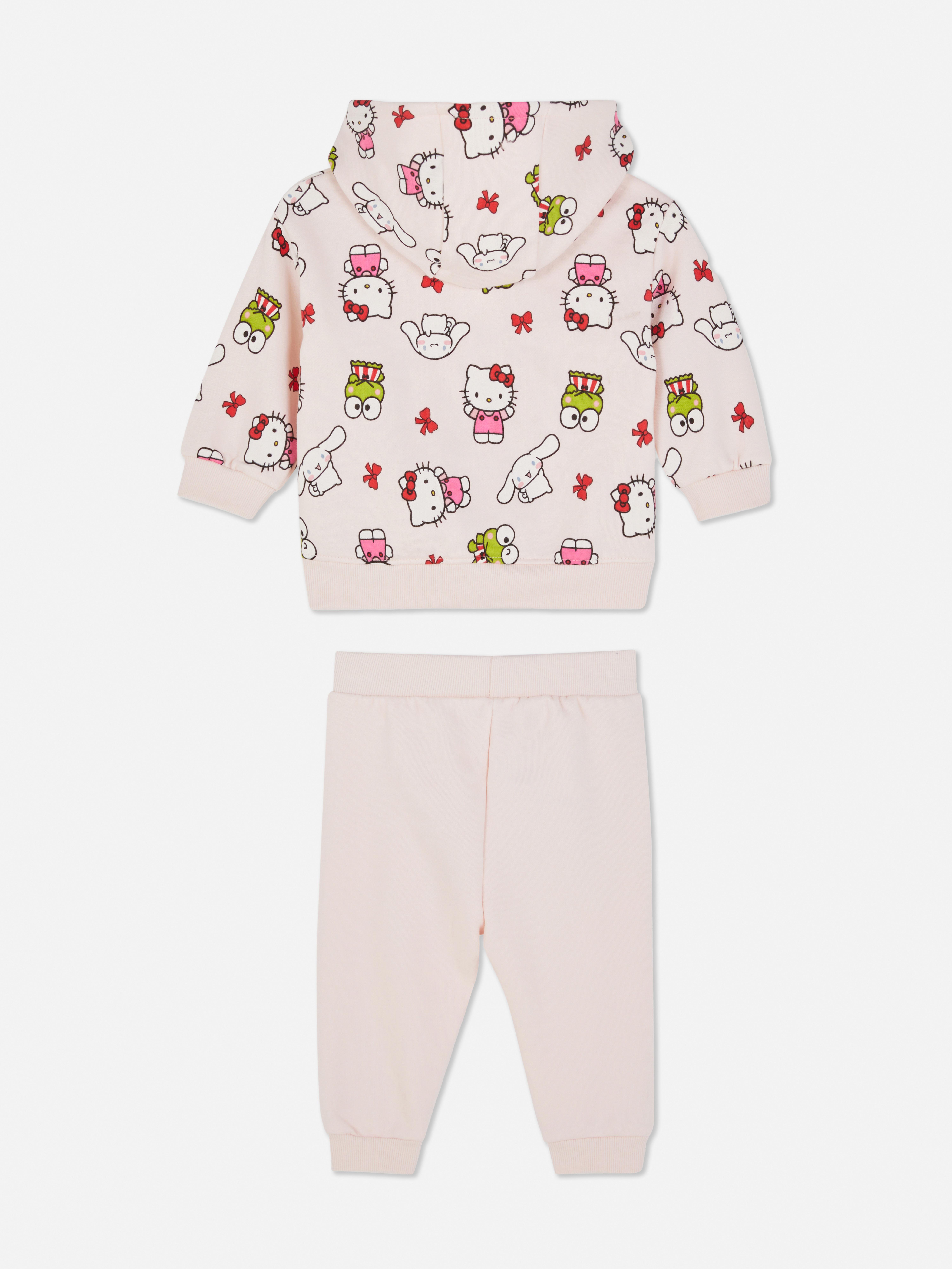 Hanorac și pantaloni de trening Hello Kitty and Friends. Hanorac cu fermoar și pantaloni de trening până la gleznă cu imprimeuri Sanrio.