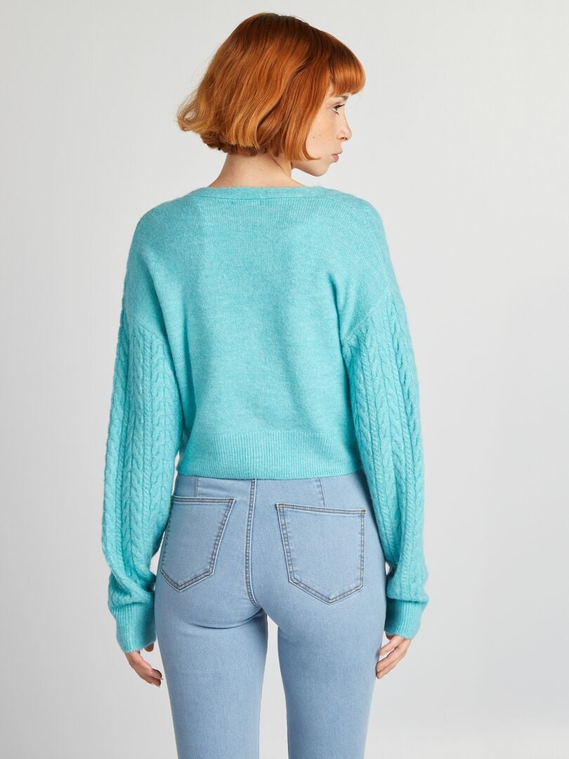 Gebreid vest met gedraaide details - BLAUW